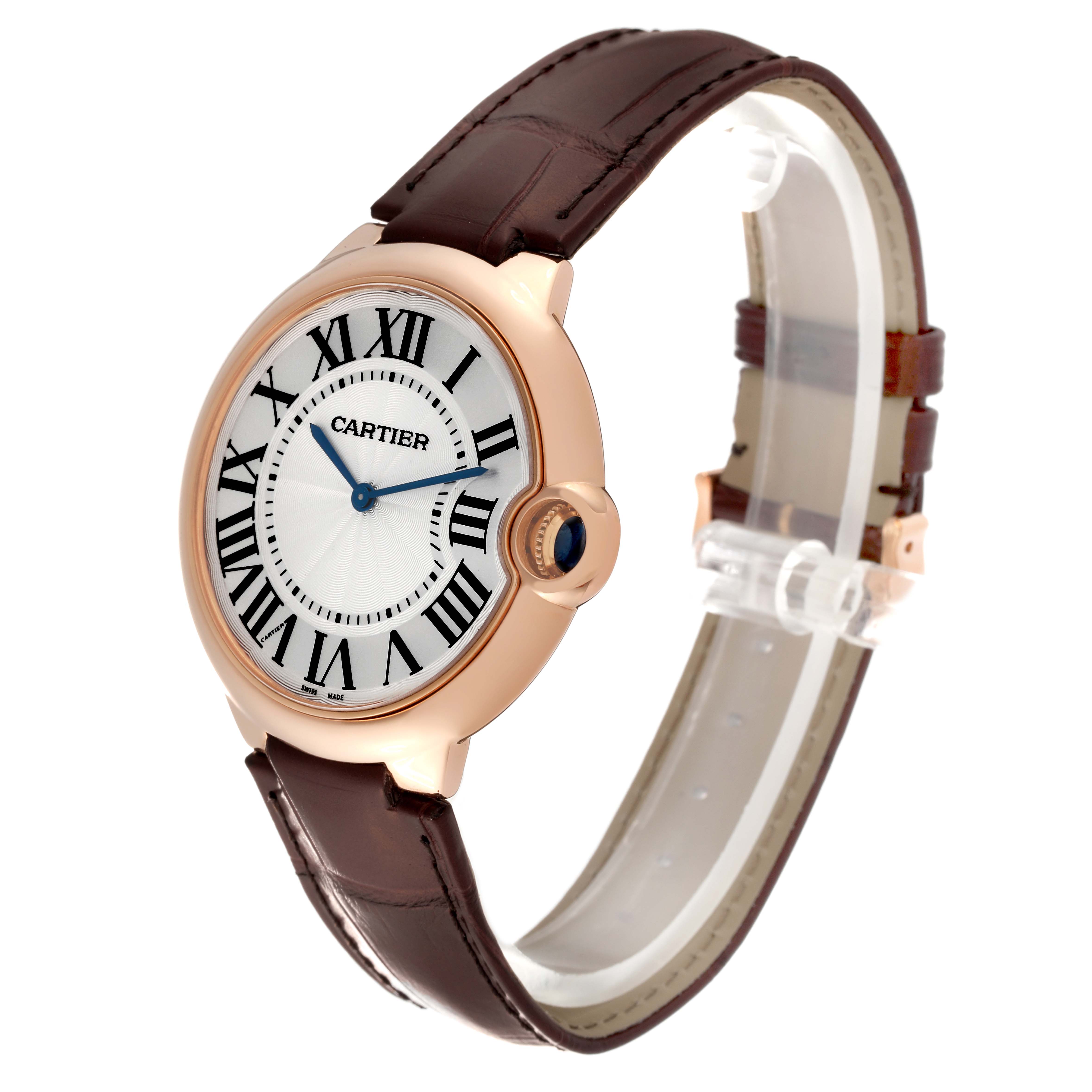 This image shows a side-angle view of the Cartier Ballon Bleu W6900651 Men's Rose Gold Silver Dial W6900651 Men's Rose Gold Silver Dial watch, highlighting its face, case, and brown leather strap.
