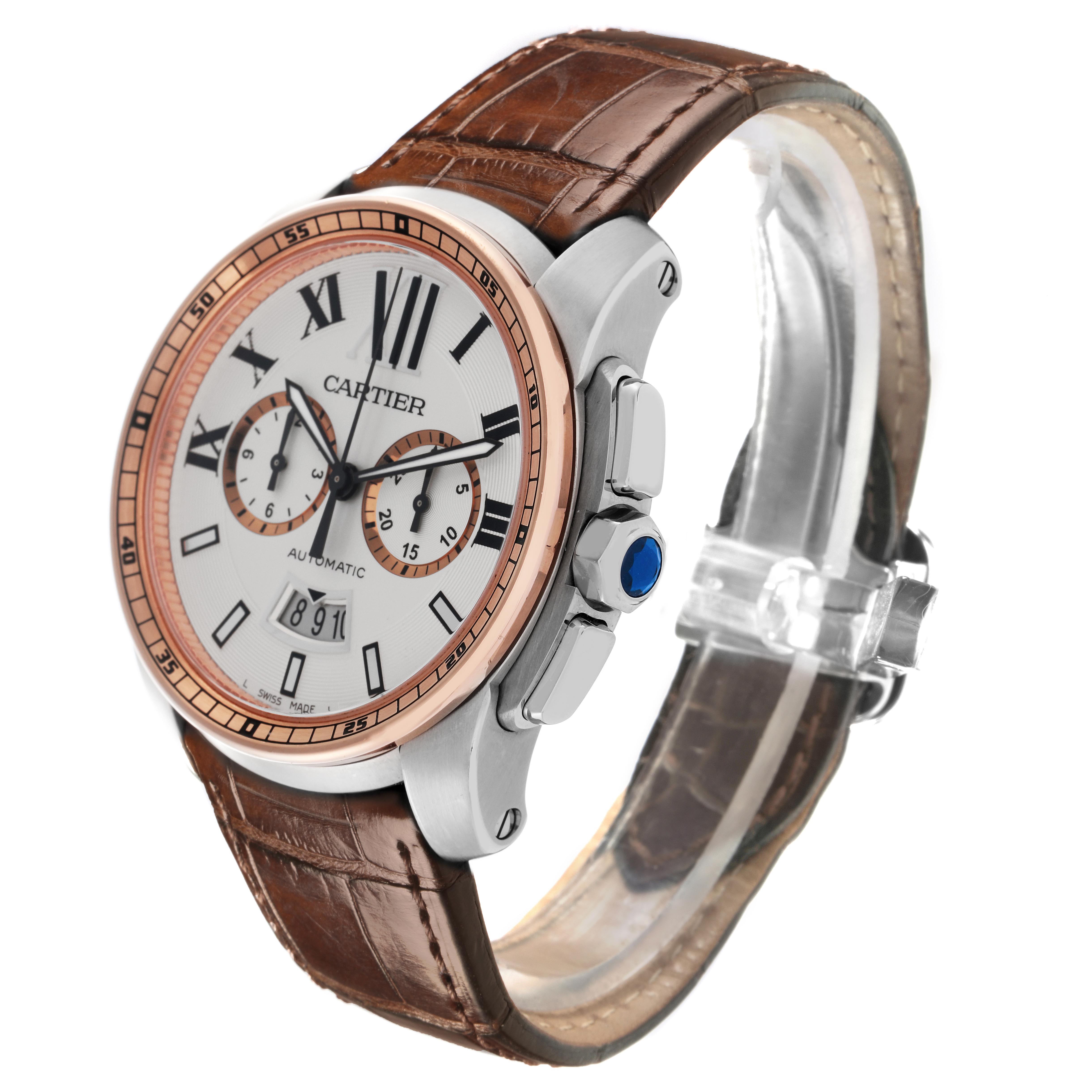 The Calibre de Cartier watch is shown at a three-quarter angle, highlighting the dial, bezel, and brown leather strap.