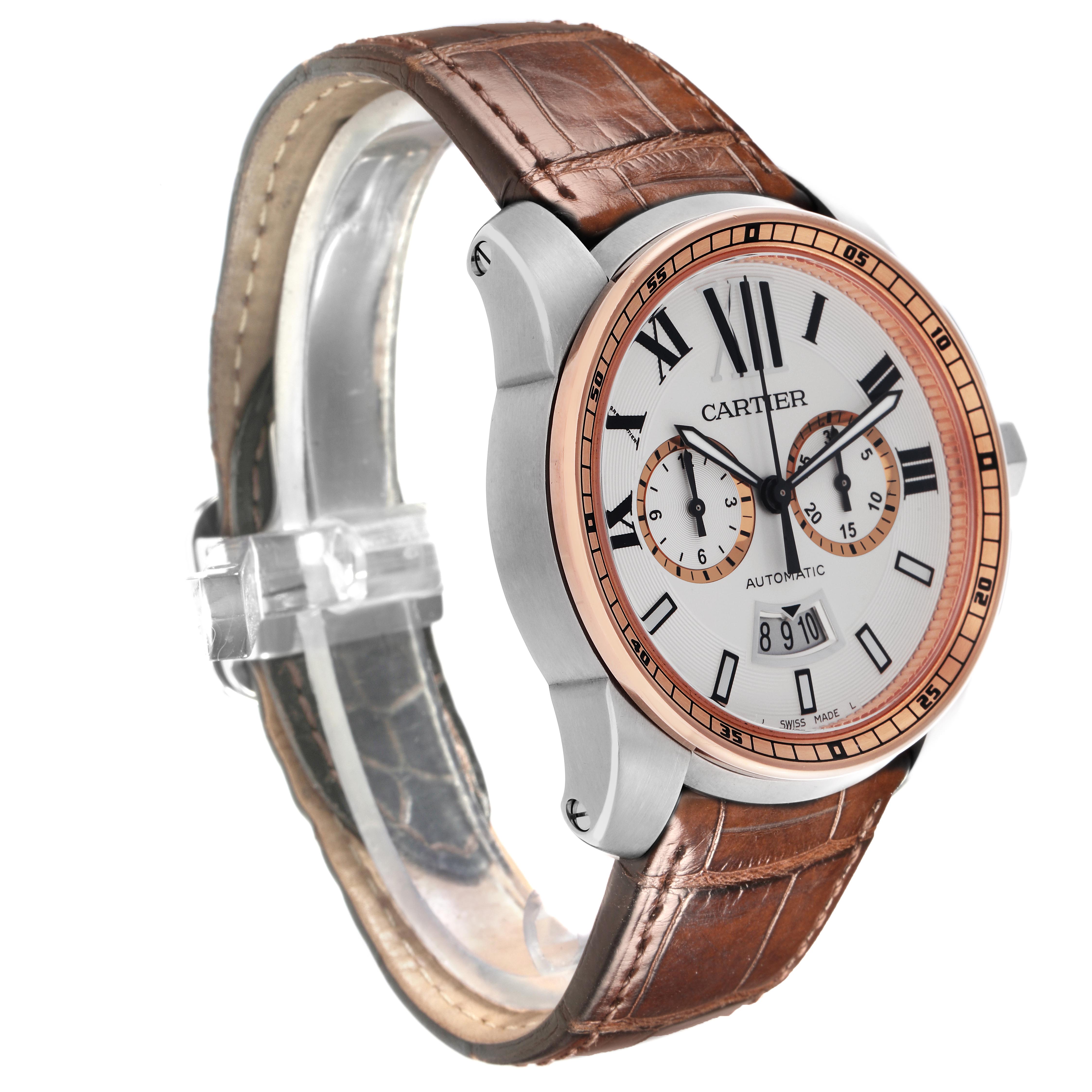 The Calibre de Cartier watch is shown at a slight angle, highlighting the face, case, and leather strap with visible dials and Roman numerals.