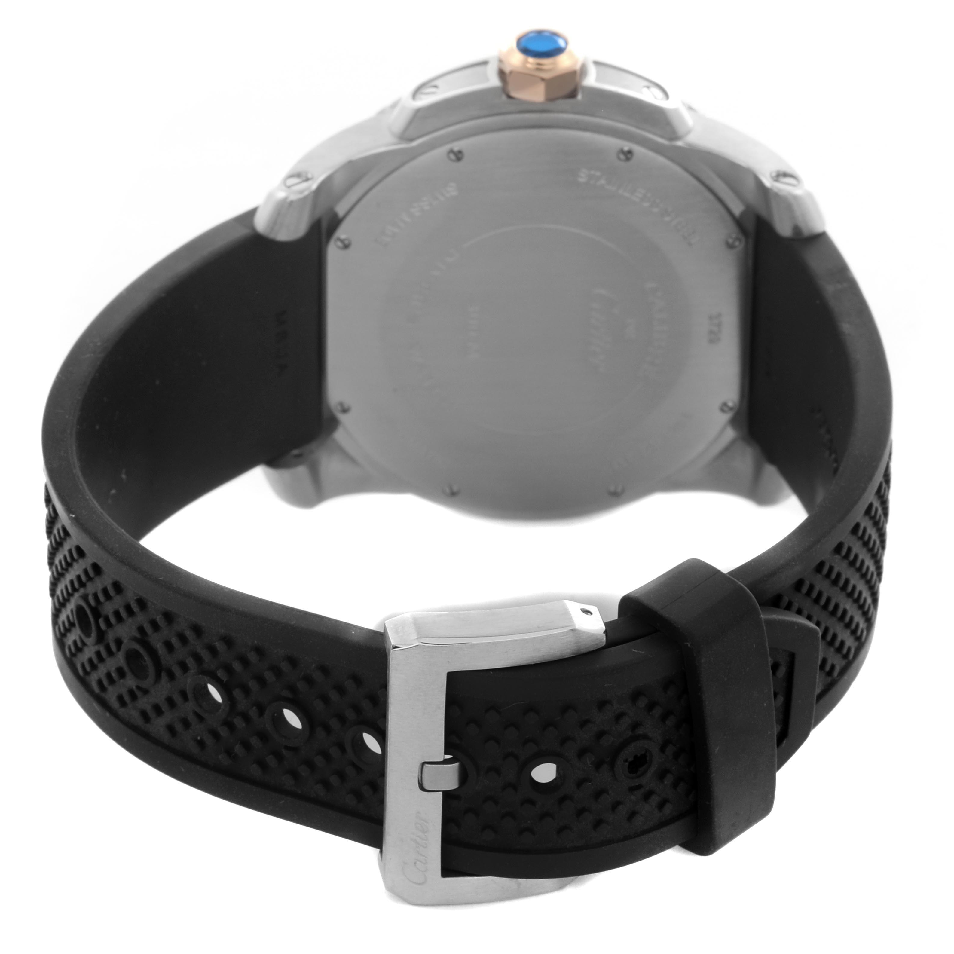 The image shows the back view of the Calibre de Cartier watch, highlighting the case back, crown, and rubber strap with a buckle.