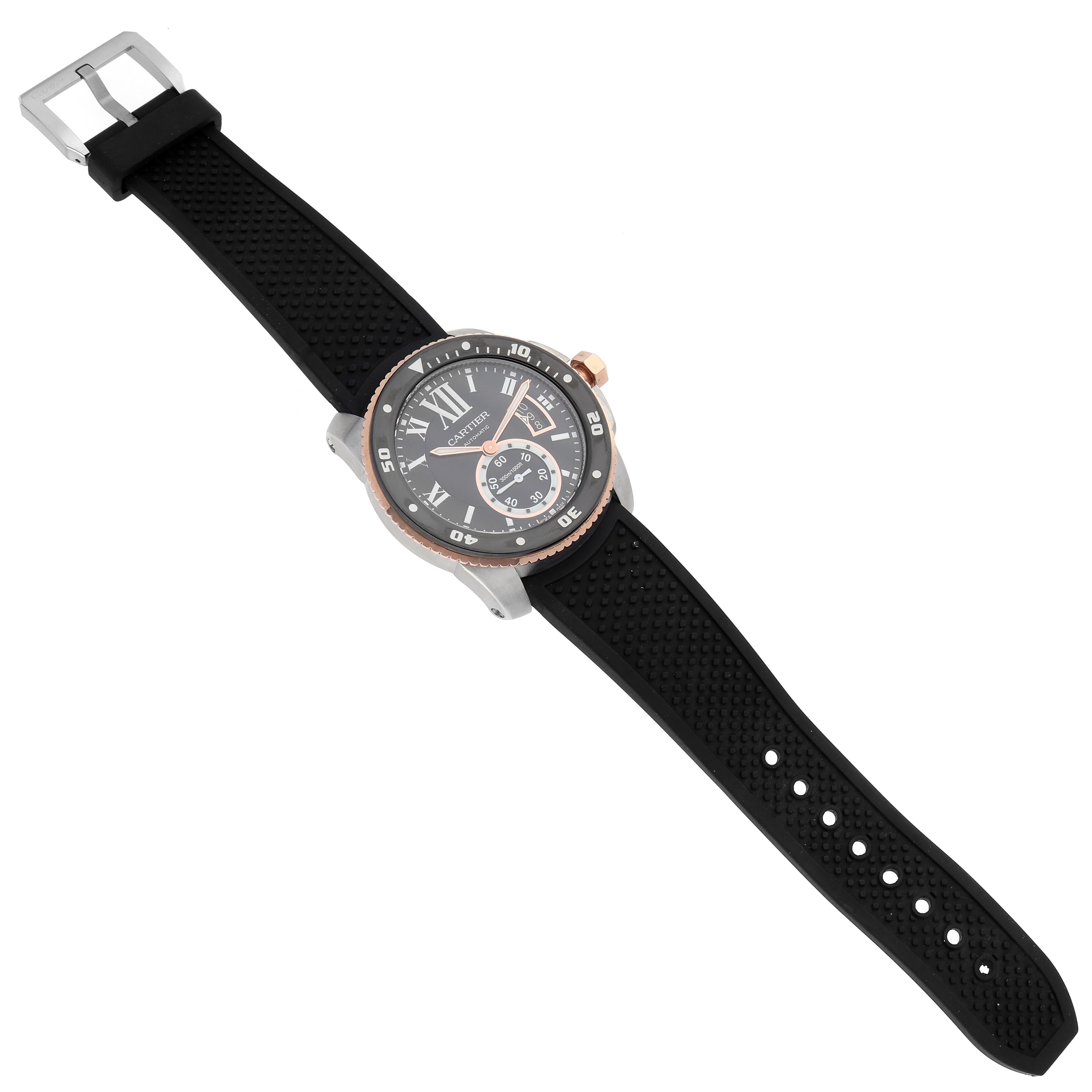 The Calibre de Cartier watch is shown angled slightly from above, displaying its face, bezel, strap, and buckle.