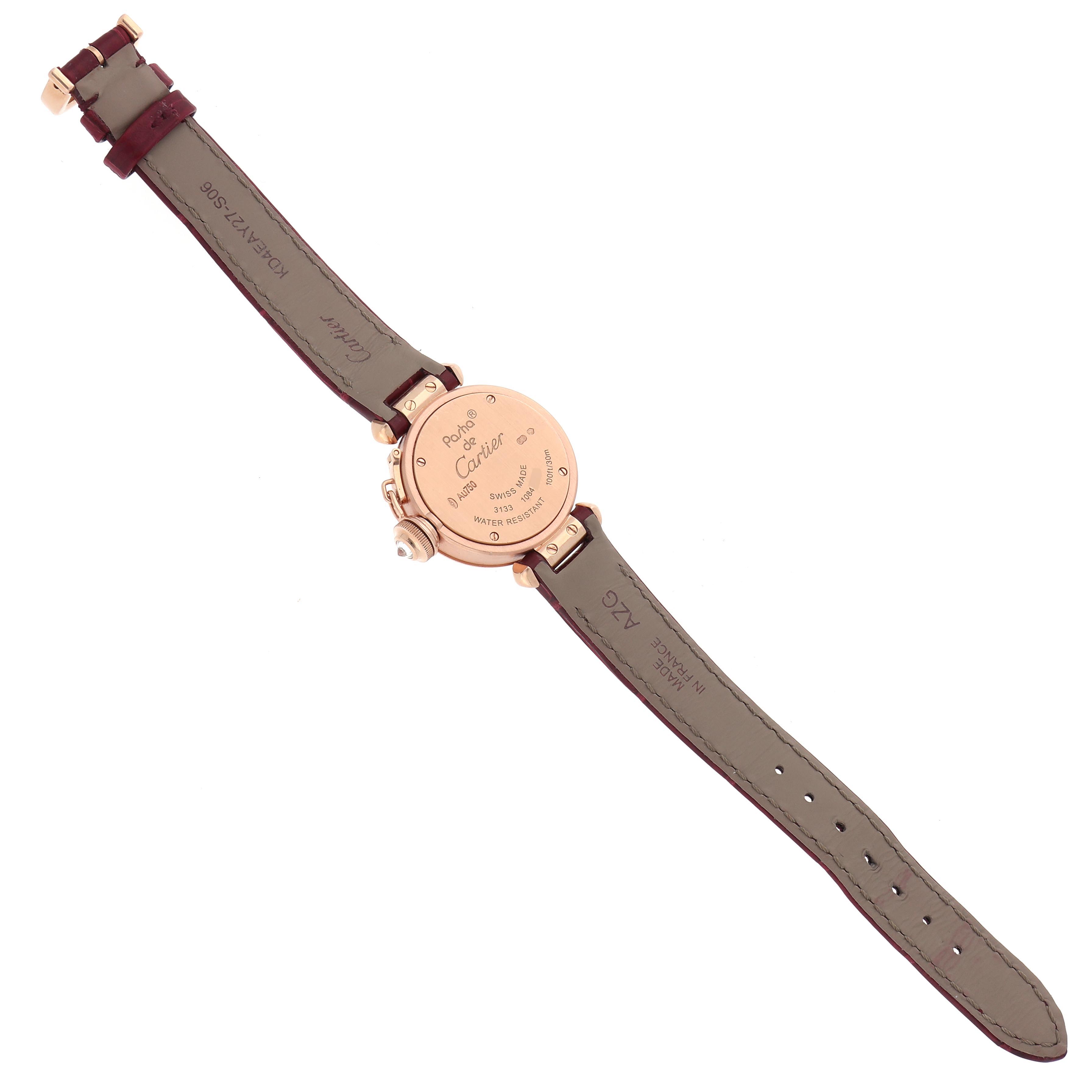 The Cartier Pasha WJ124026 Women's Rose Gold Silver Dial WJ124026 Women's Rose Gold Silver Dial watch is shown from the back, displaying the caseback and leather strap.