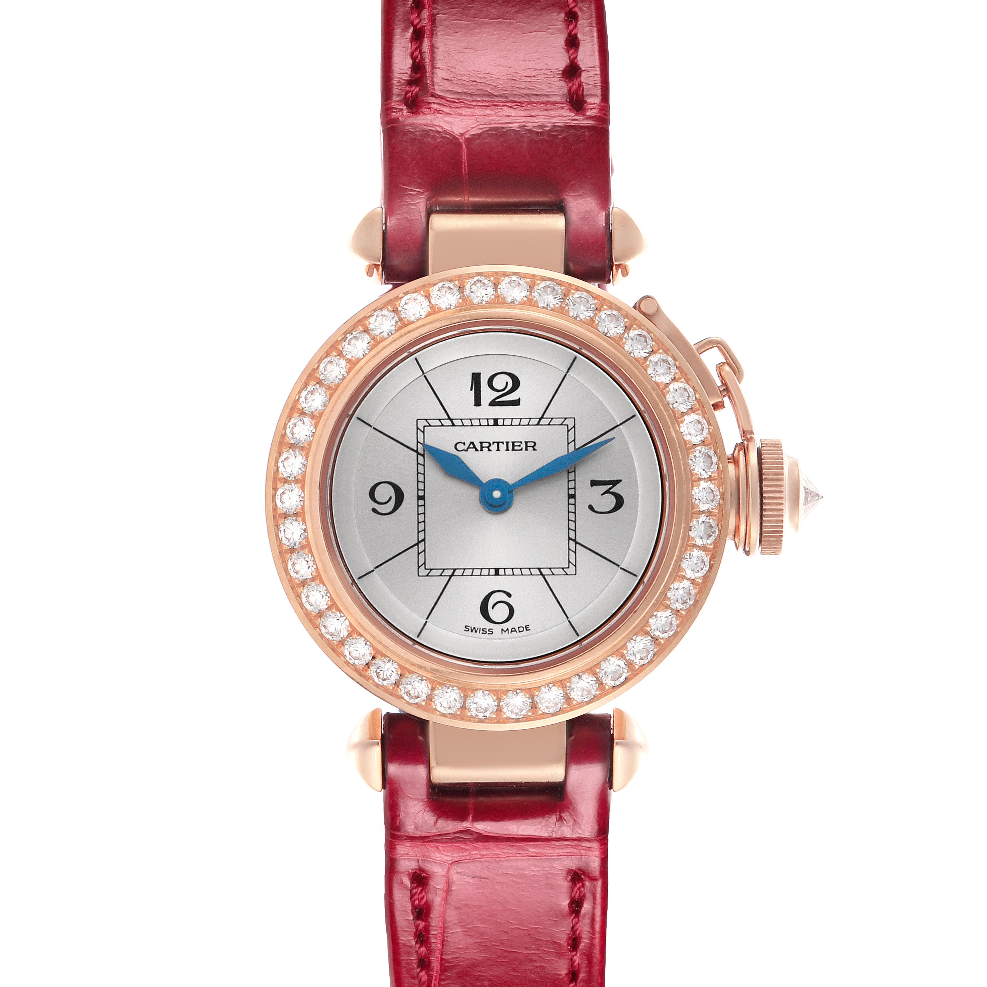 The Cartier Pasha WJ124026 Women's Rose Gold Silver Dial WJ124026 Women's Rose Gold Silver Dial watch is shown from a frontal angle featuring a diamond-set bezel and red leather strap.