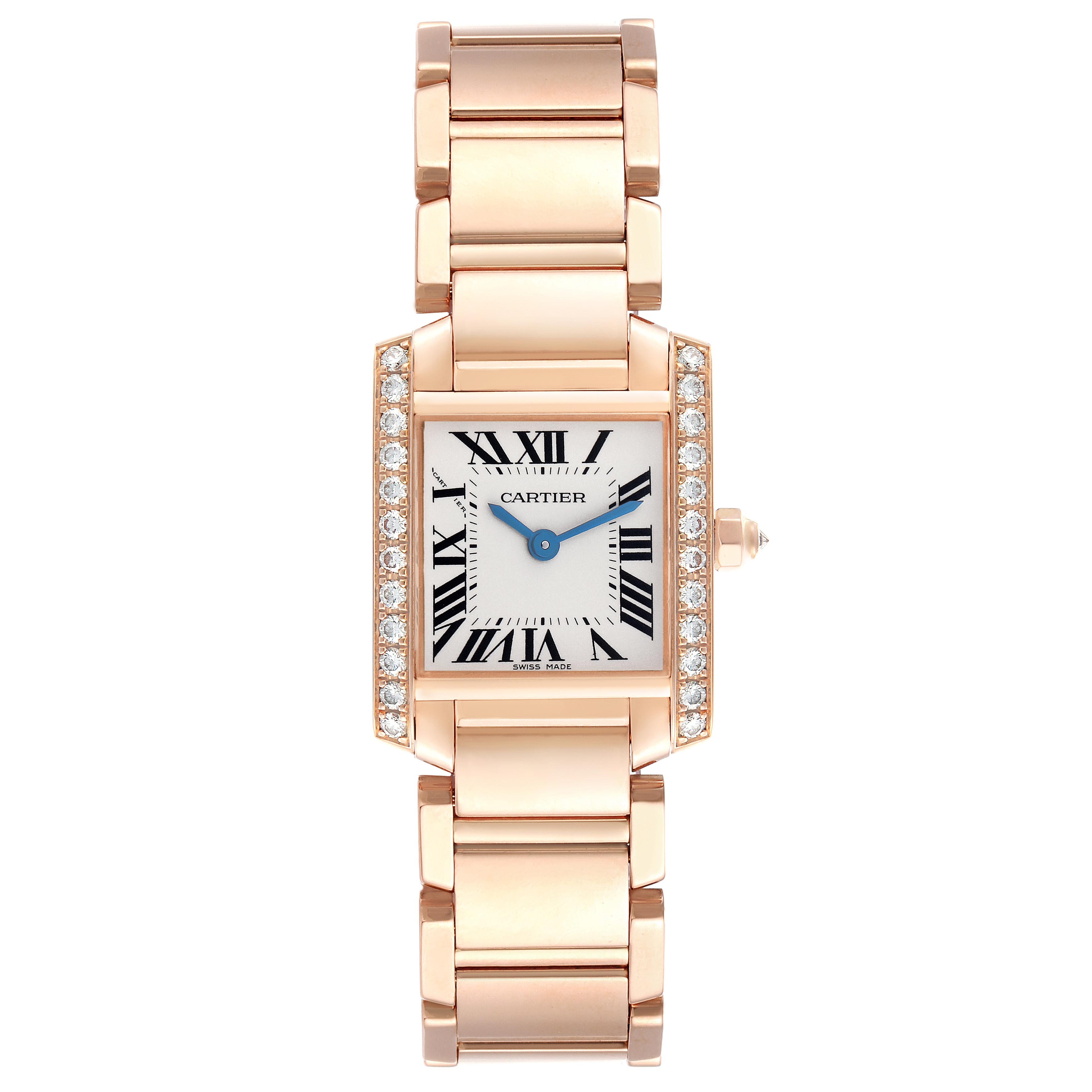 The Cartier Tank Francaise WE10456H Women
s Rose Gold Silver Dial WE10456H Women
s Rose Gold Silver Dial watch is shown from a top-down angle, highlighting its rectangular face and metal bracelet.