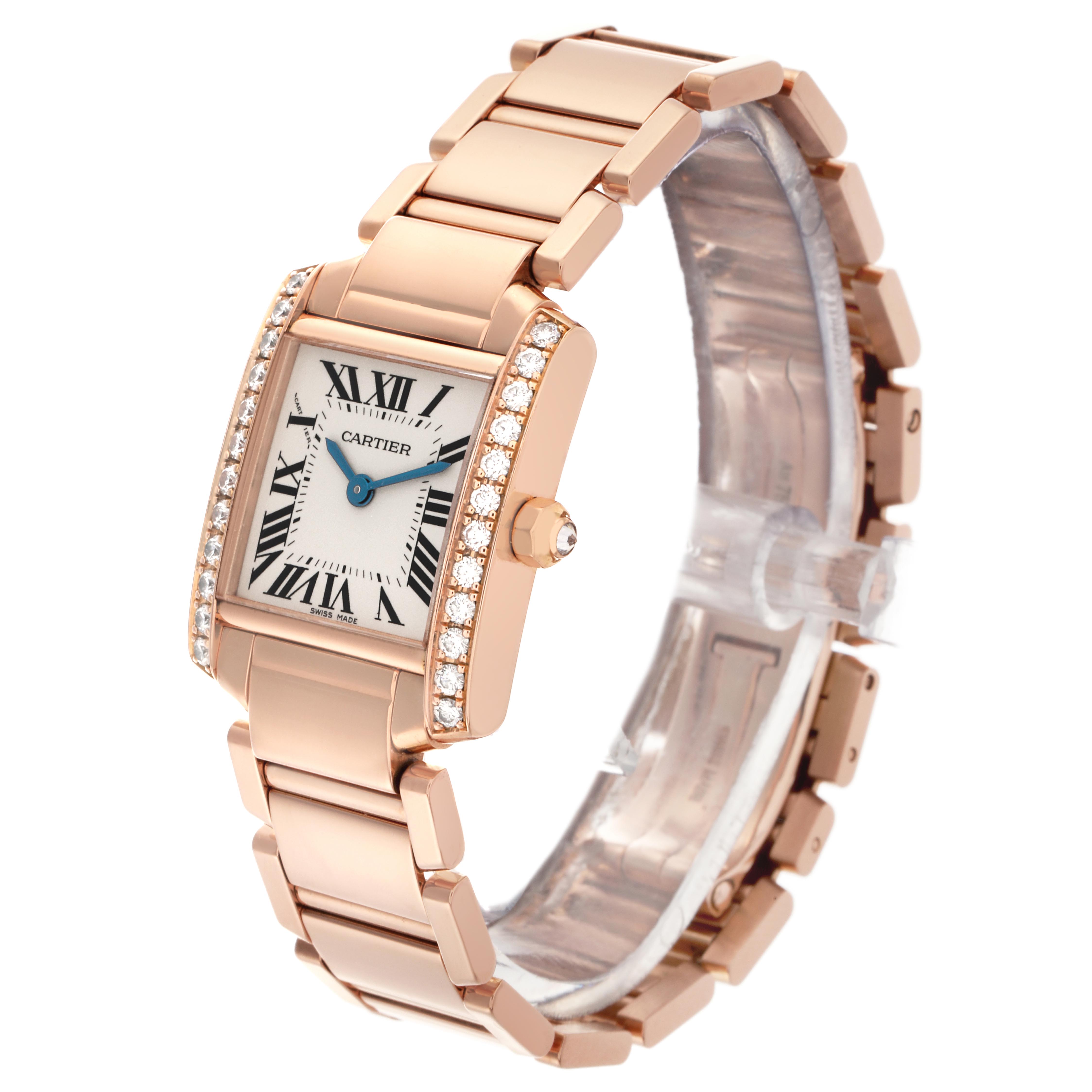 The Cartier Tank Francaise WE10456H Women
s Rose Gold Silver Dial WE10456H Women
s Rose Gold Silver Dial watch is shown at a three-quarter angle, highlighting the band, face, and diamond accents.