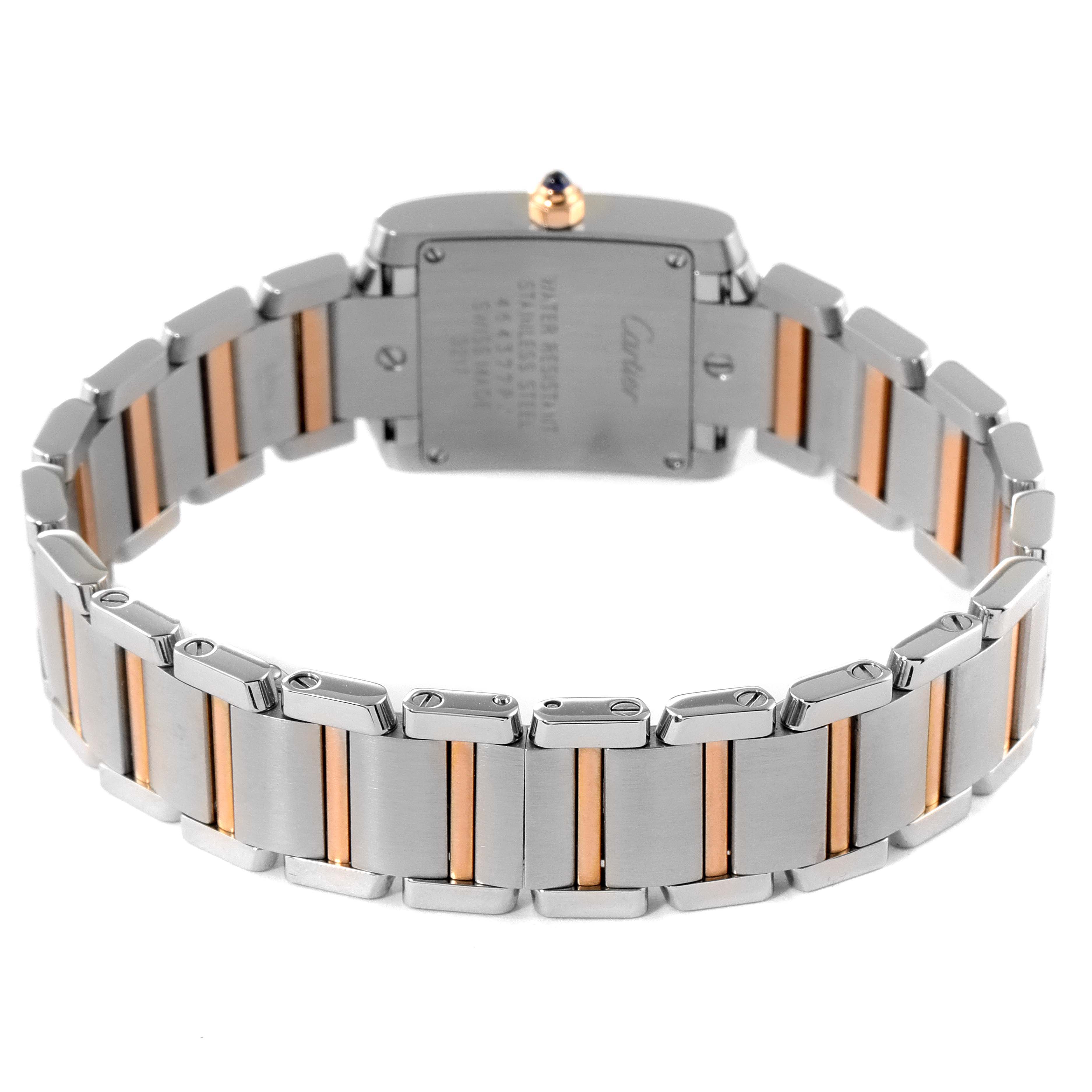 The image shows the back of a Cartier Tank Française watch and its two-tone metal bracelet.