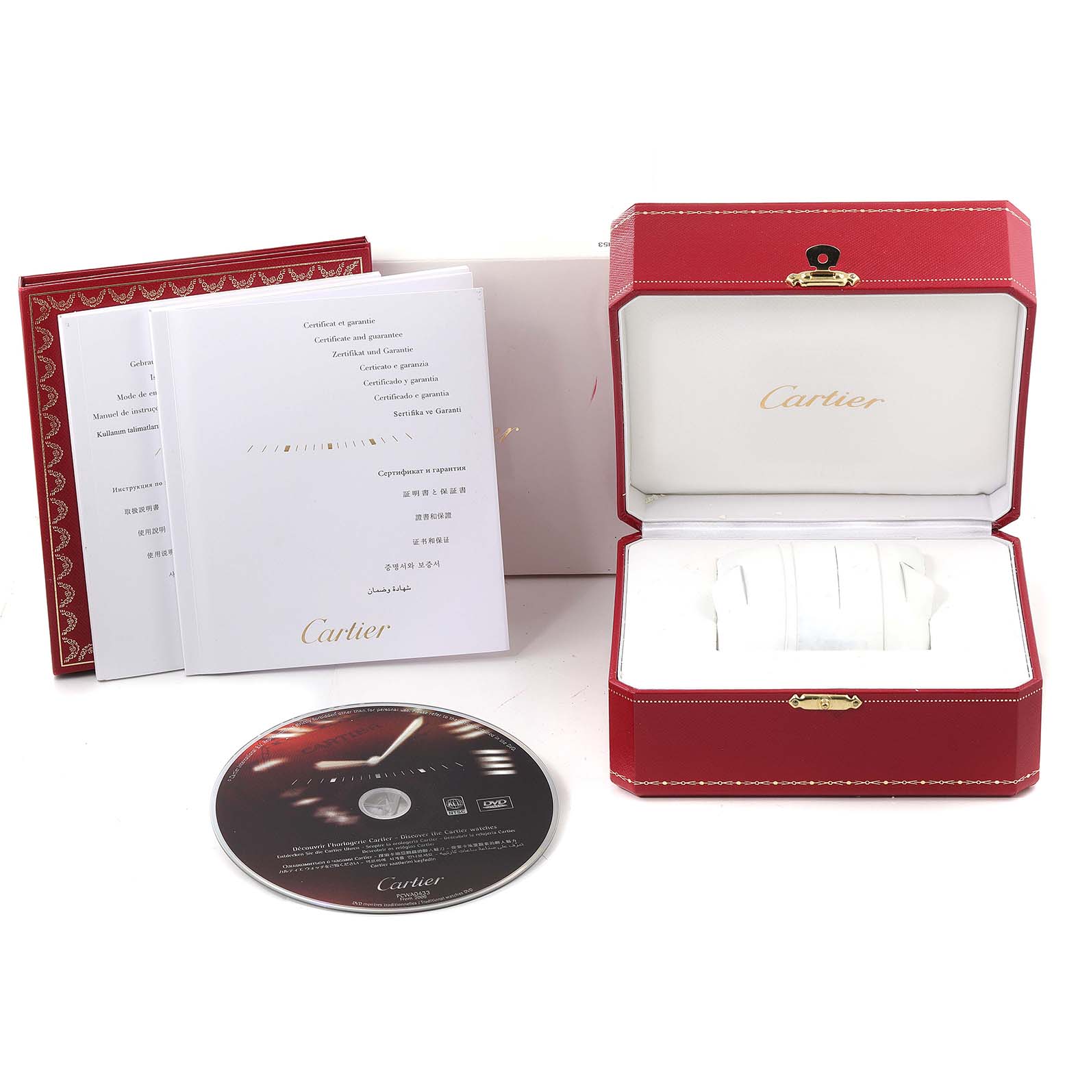 This image shows the Cartier Tank Francaise W5010001 Women's Steel and Gold (two tone) Black Dial W5010001 Women's Steel and Gold (two tone) Black Dial watch accessories including the box, manuals, and a CD from a front angle.