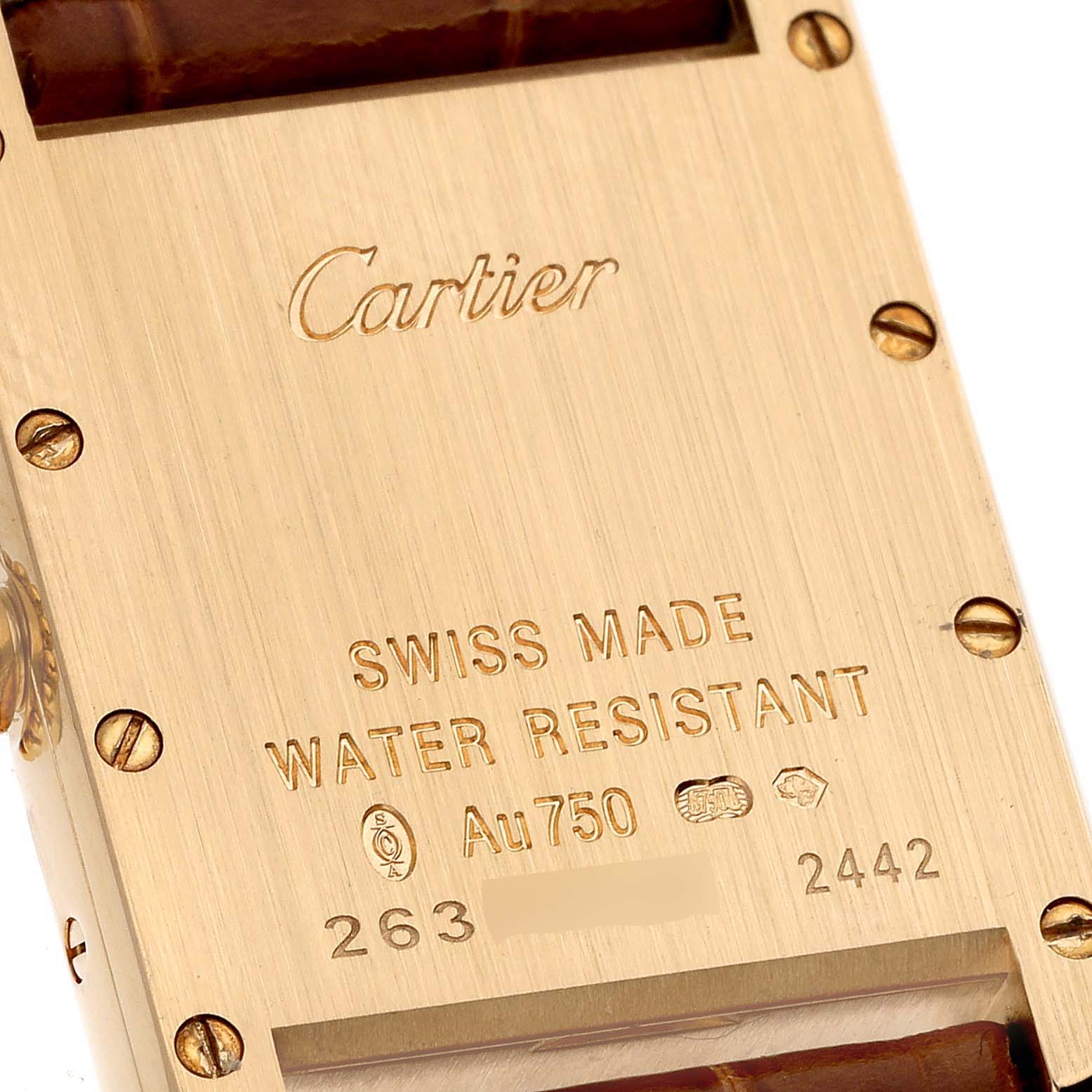 This image shows the back case of a Cartier Tank Louis W1529856 Women's Yellow Gold Silver Dial W1529856 Women's Yellow Gold Silver Dial watch, displaying details like "Swiss Made," "Water Resistant," and gold markings.