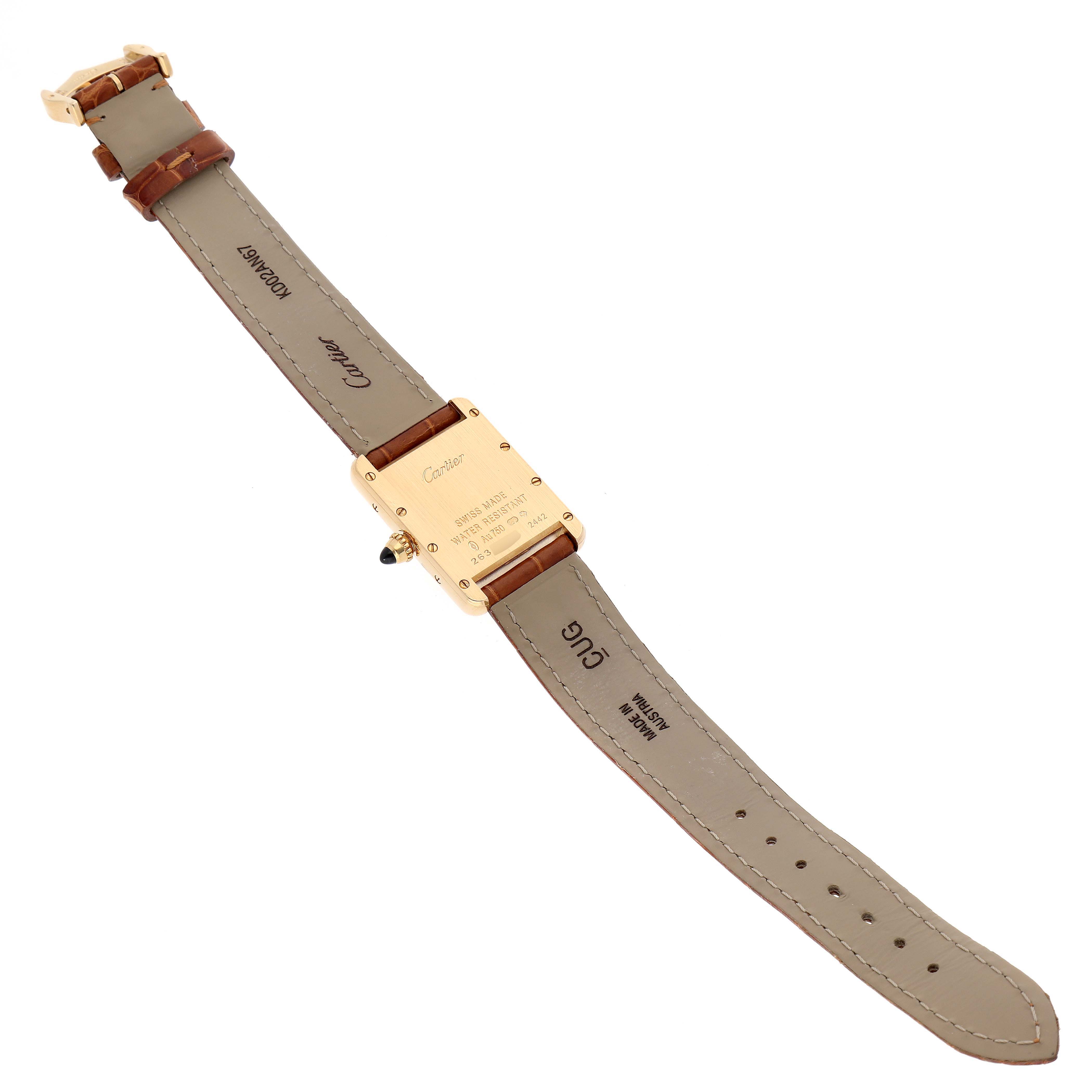 The image shows the back view of the Cartier Tank Louis W1529856 Women's Yellow Gold Silver Dial W1529856 Women's Yellow Gold Silver Dial watch, including the case back, straps, and buckle.