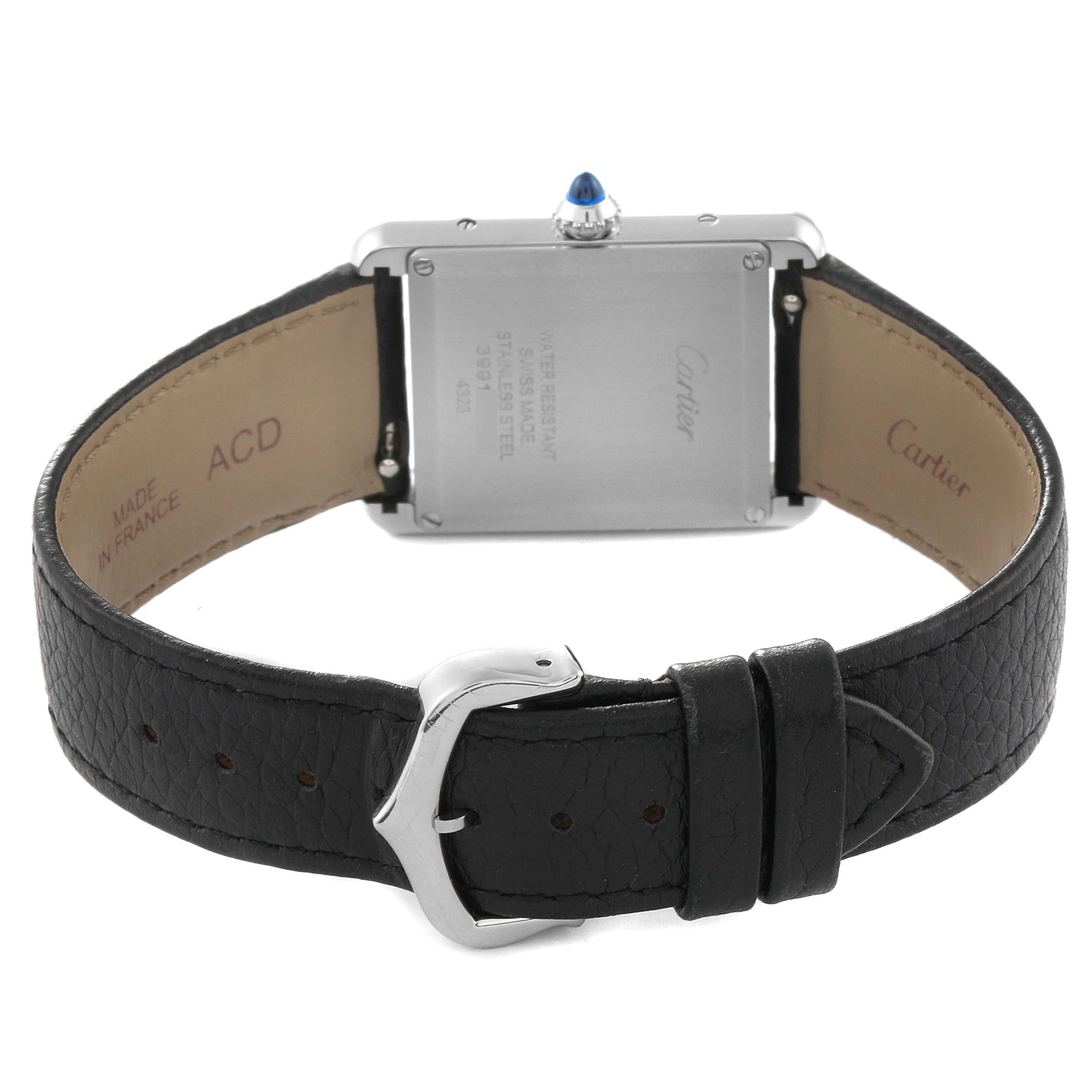 This image shows the back view of the Cartier Tank Must W4TA0017 Women
s Stainless Steel Silver Dial W4TA0017 Women
s Stainless Steel Silver Dial watch, highlighting the case back, leather strap, and buckle.