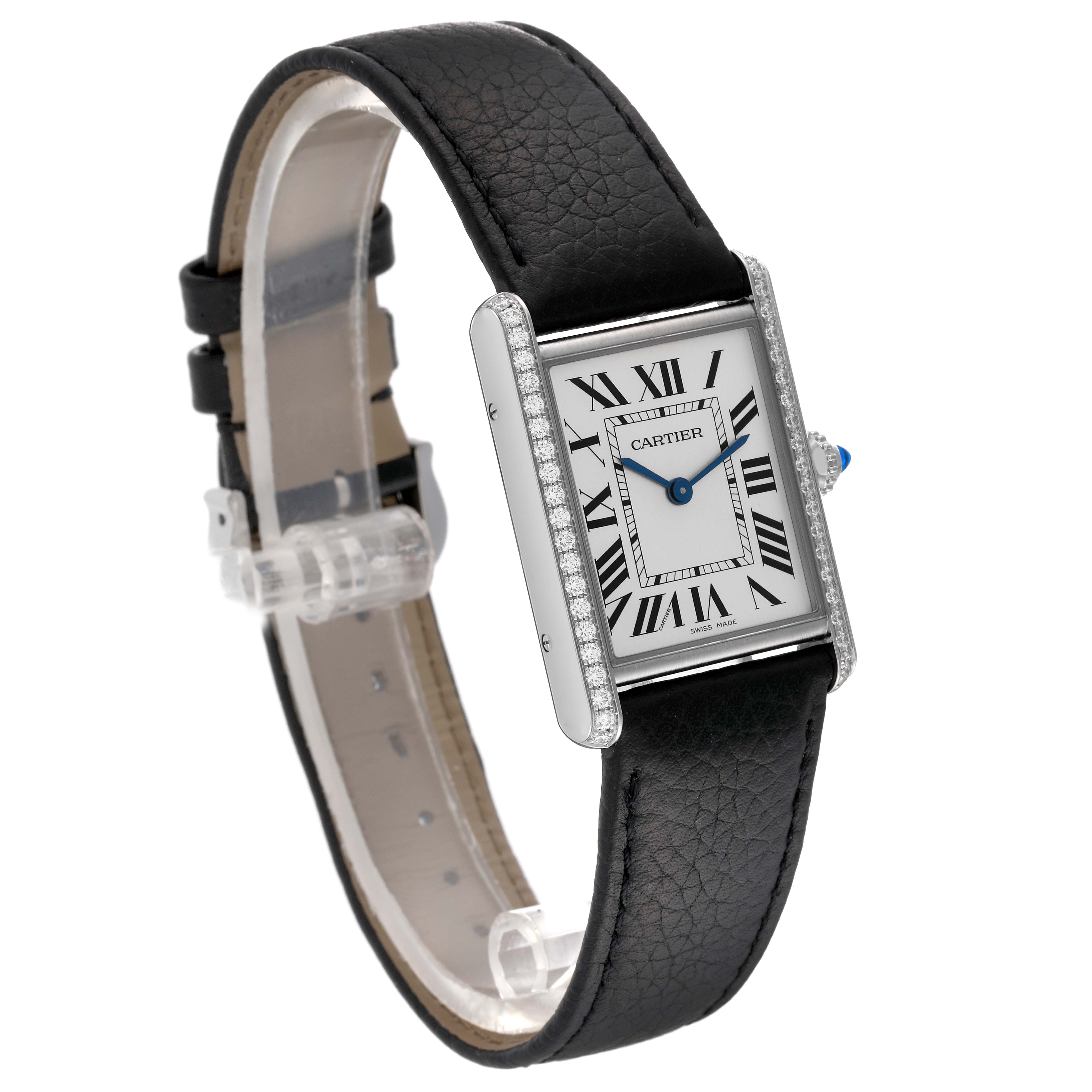 The image shows a Cartier Tank Must W4TA0017 Women
s Stainless Steel Silver Dial W4TA0017 Women
s Stainless Steel Silver Dial watch at a three-quarter angle, highlighting its face, strap, and side profile.