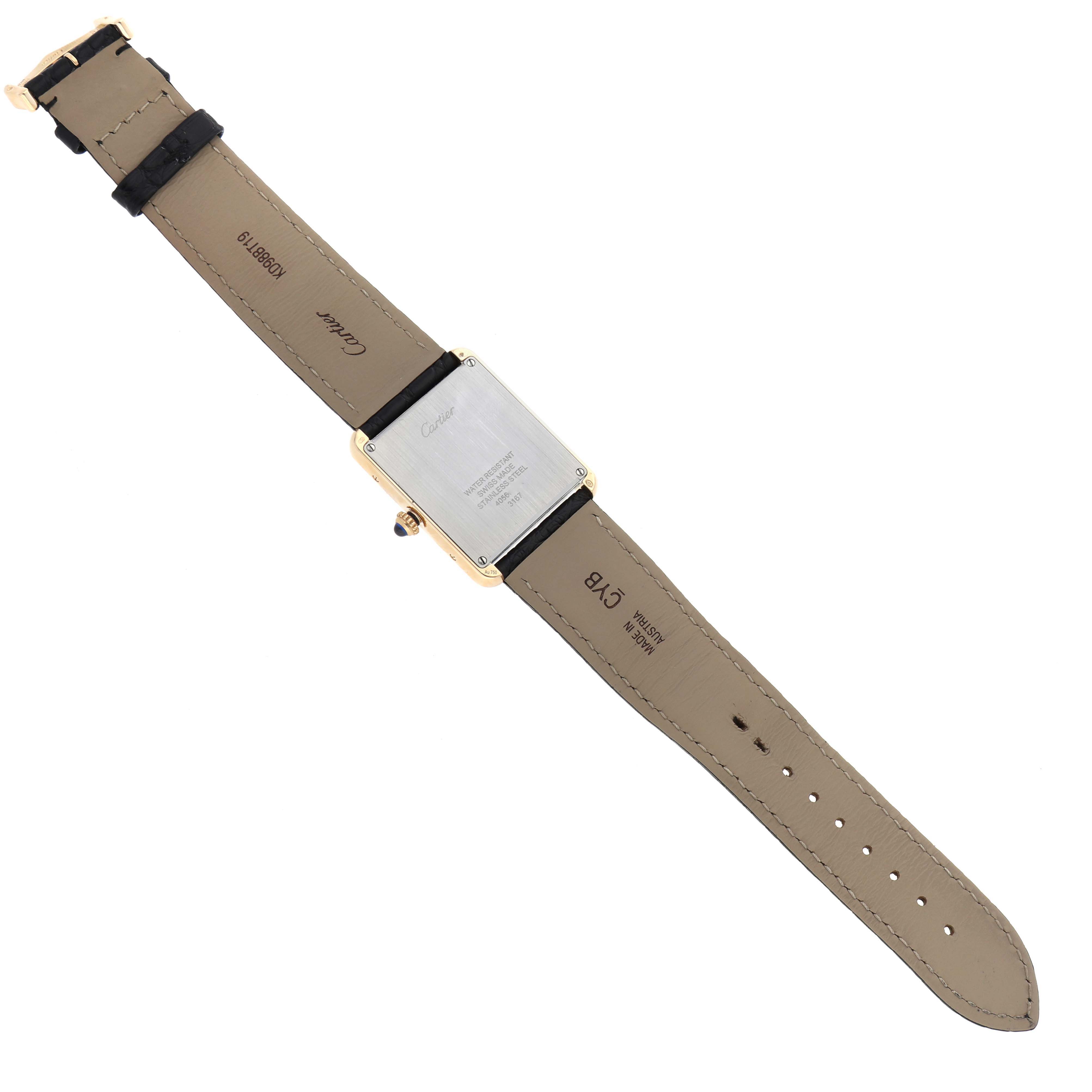 The image shows the back view of the Cartier Tank Solo W5200004 Men
s Steel and Gold (two tone) Silver Dial W5200004 Men
s Steel and Gold (two tone) Silver Dial watch, including its case back and leather straps.