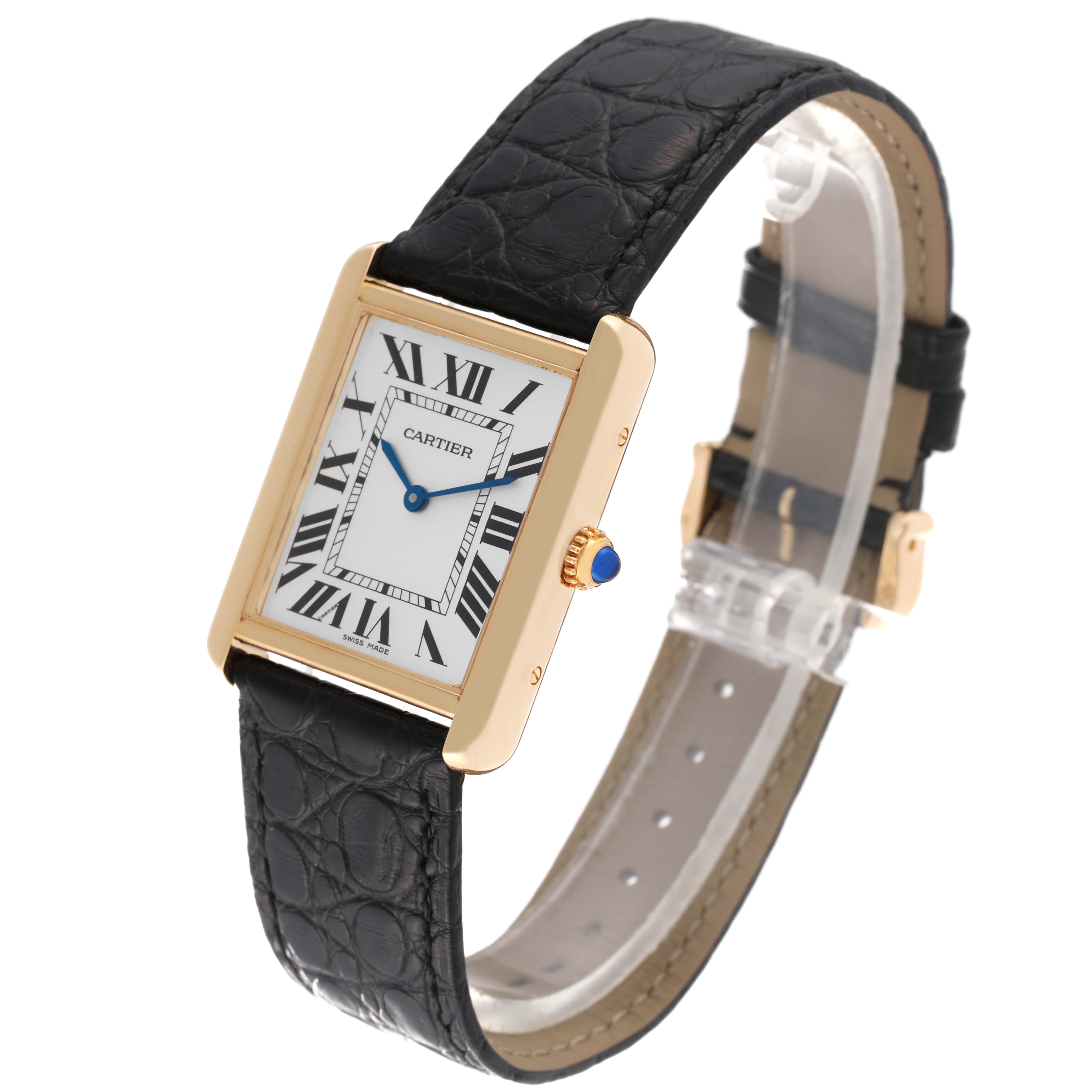 The Cartier Tank Solo W5200004 Men
s Steel and Gold (two tone) Silver Dial W5200004 Men
s Steel and Gold (two tone) Silver Dial watch is shown at an angle highlighting the face, crown, and black leather strap.