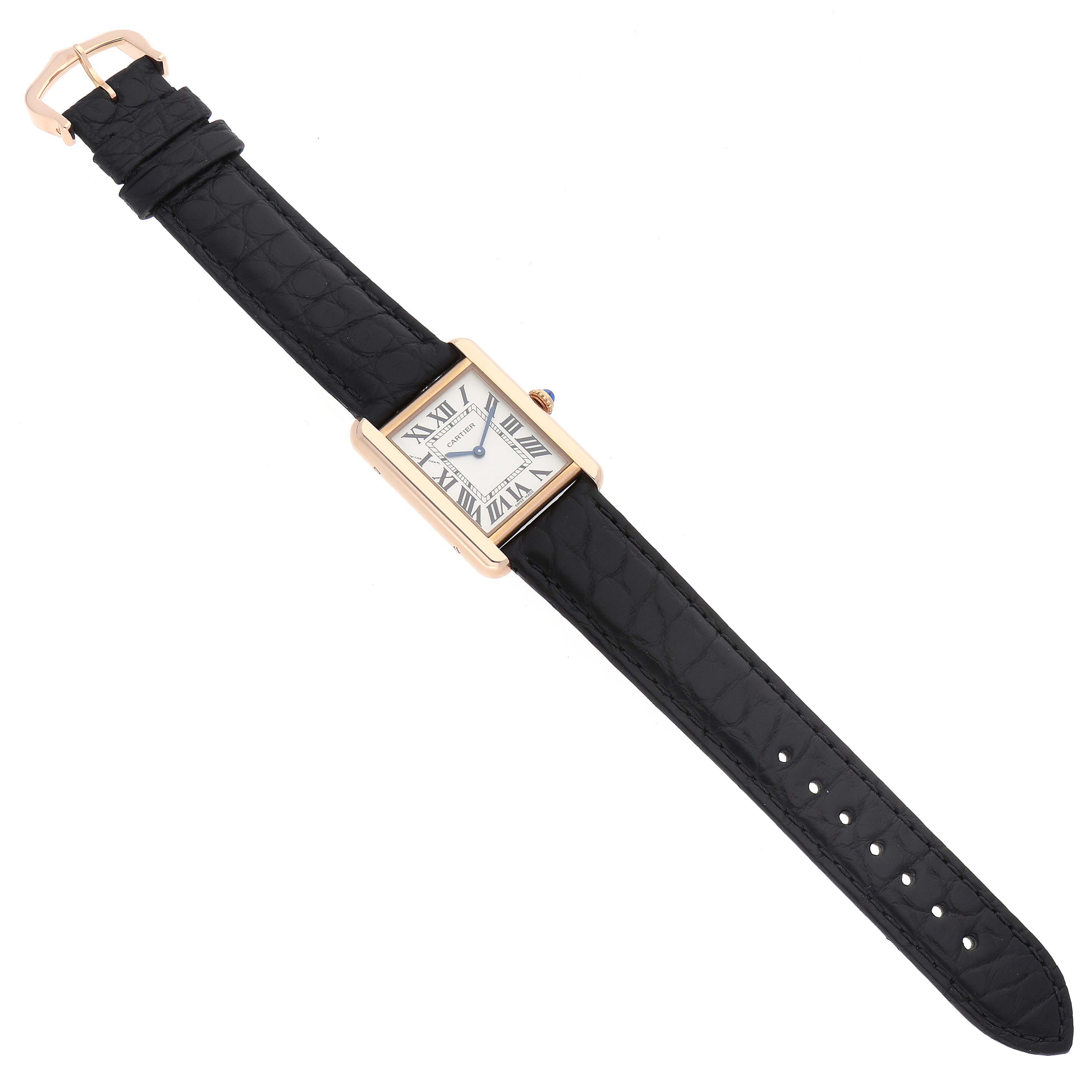 This image shows a Cartier Tank Solo W5200024 Women
s Steel and Gold (two tone) Silver Dial W5200024 Women
s Steel and Gold (two tone) Silver Dial watch with a rectangular face and black leather strap from an overhead angle.