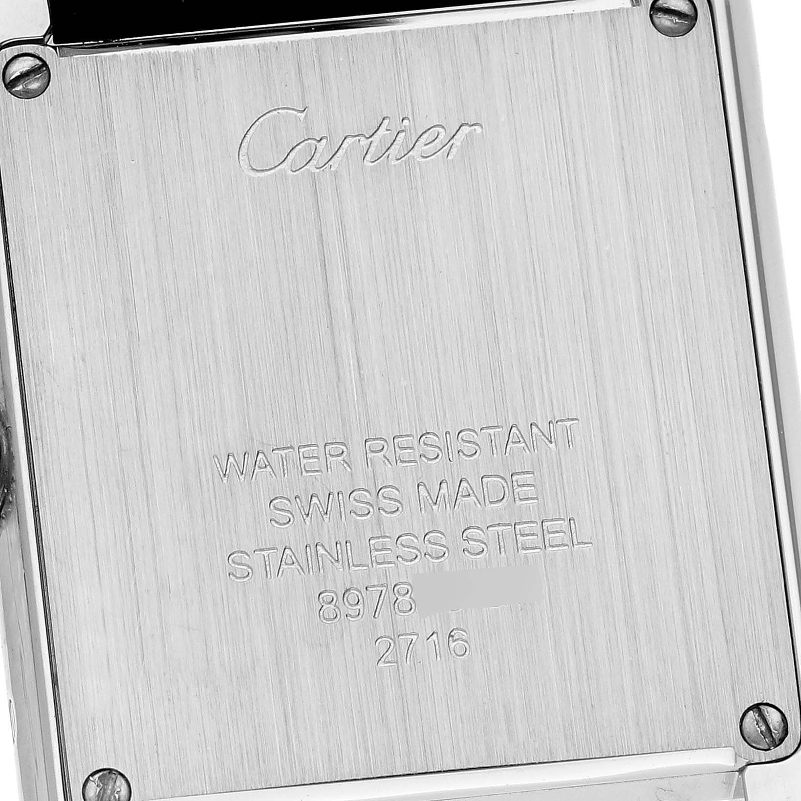 This image shows the stainless steel back case of a Cartier Tank Solo W1018255 Women
s Stainless Steel Silver Dial W1018255 Women
s Stainless Steel Silver Dial watch.
