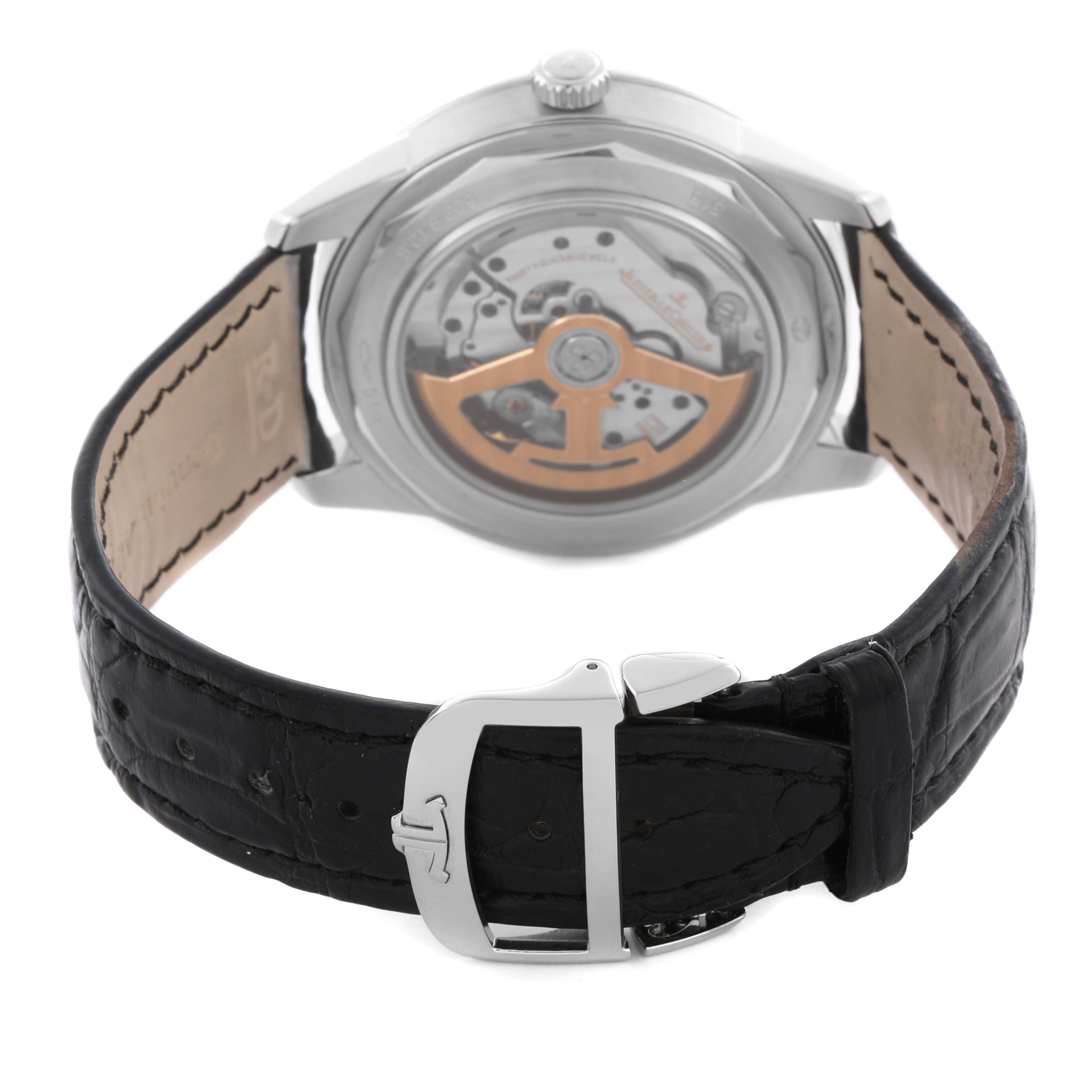 The Jaeger LeCoultre Geophysic Q8108420 Men's Stainless Steel Blue Dial Q8108420 Men's Stainless Steel Blue Dial watch is shown from the back, highlighting the movement and black leather strap with a clasp.