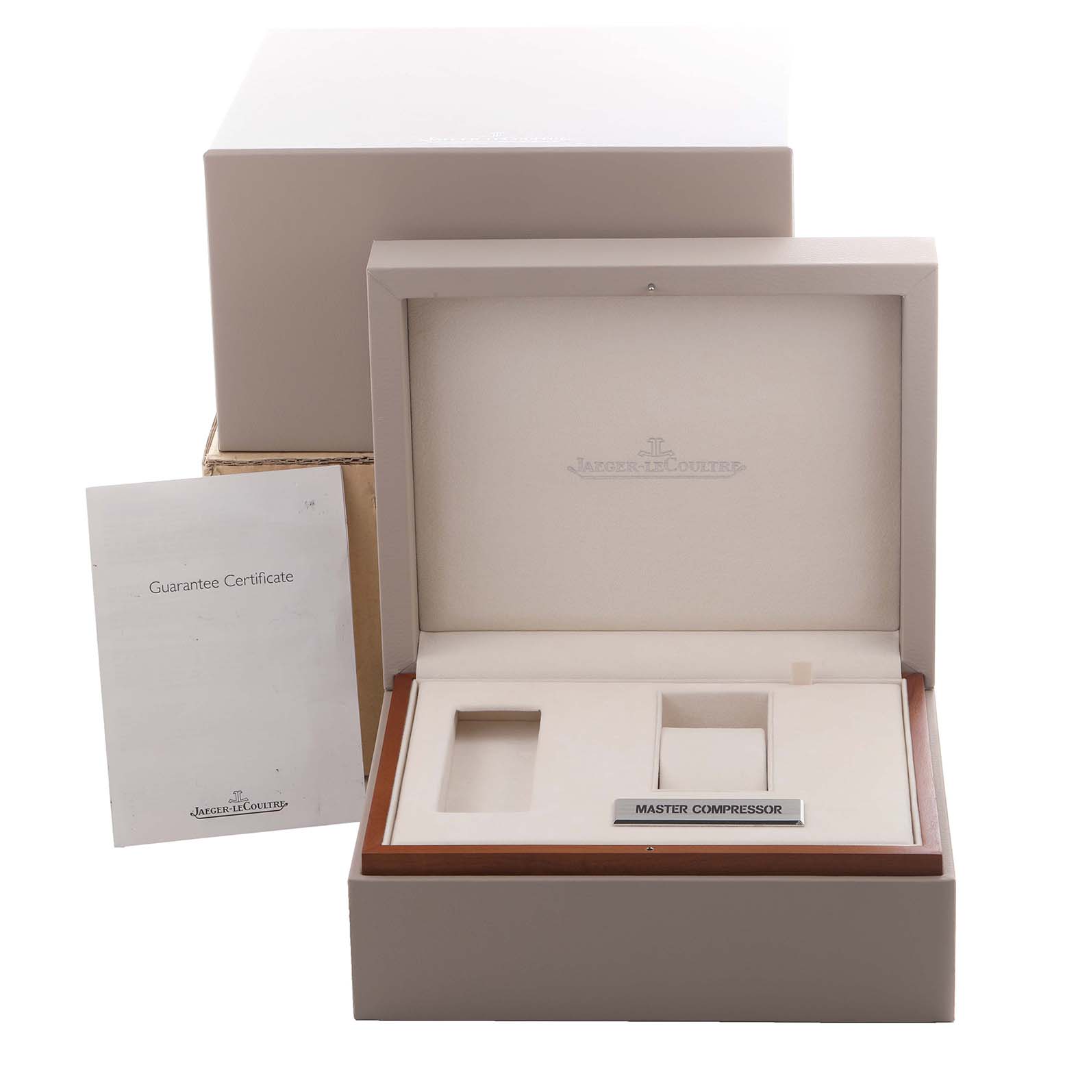 The image shows an open Jaeger LeCoultre watch box for the Geophysic model, alongside a guarantee certificate.