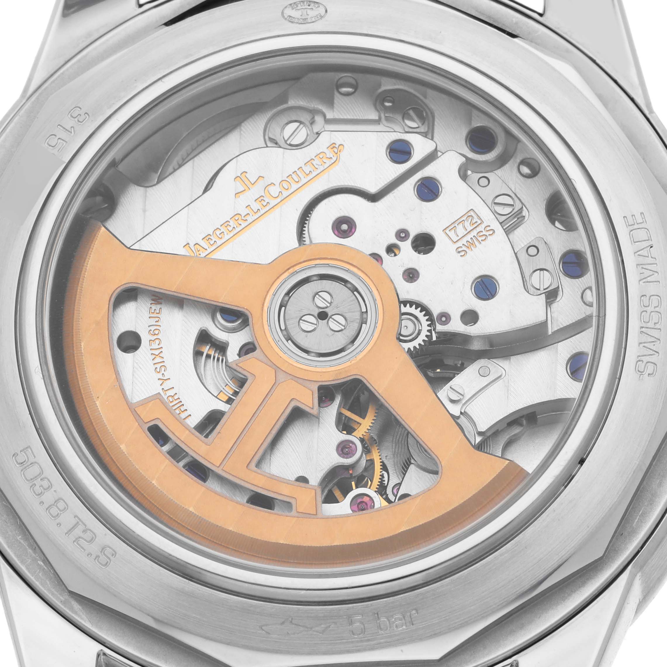 The image shows the caseback of the Jaeger LeCoultre Geophysic Q8108420 Men's Stainless Steel Blue Dial Q8108420 Men's Stainless Steel Blue Dial, highlighting its intricate movement and rotor.