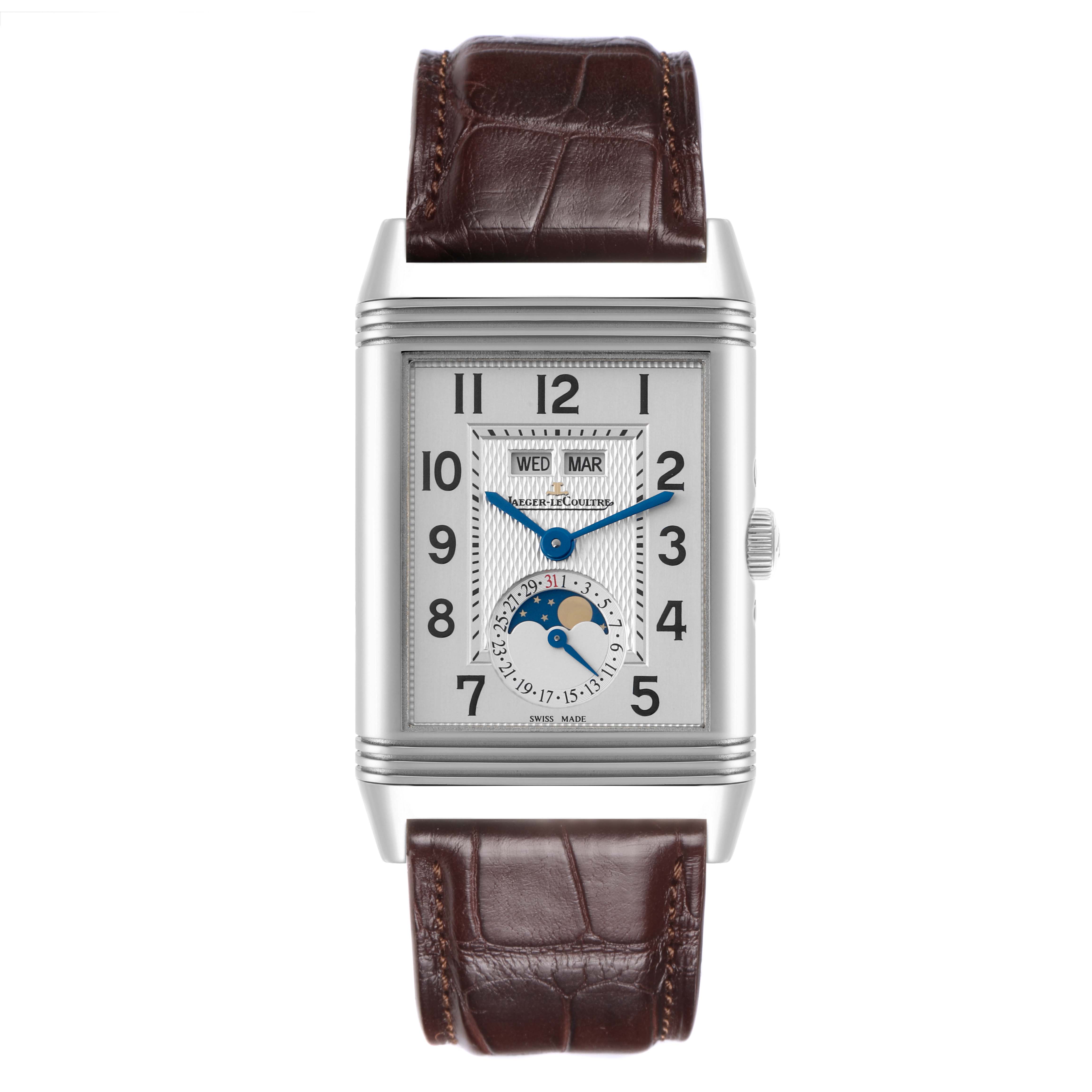 The Jaeger LeCoultre Reverso Q3758420 Men's Stainless Steel Silver Dial Q3758420 Men's Stainless Steel Silver Dial watch is shown from the front, featuring its dial, moon phase, and brown leather strap.
