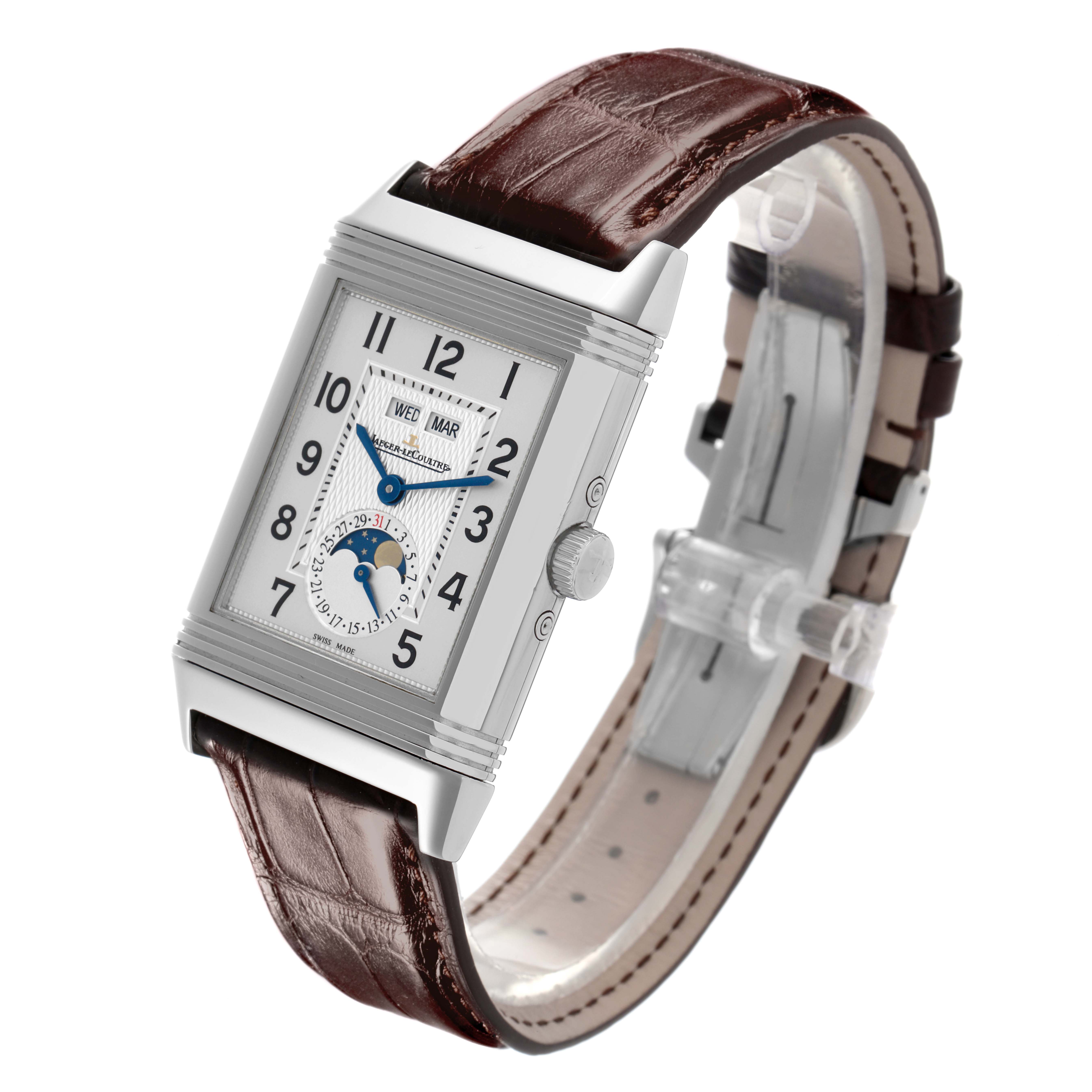 The Jaeger LeCoultre Reverso Q3758420 Men's Stainless Steel Silver Dial Q3758420 Men's Stainless Steel Silver Dial watch is angled to show its rectangular face, brown leather strap, and side crown.