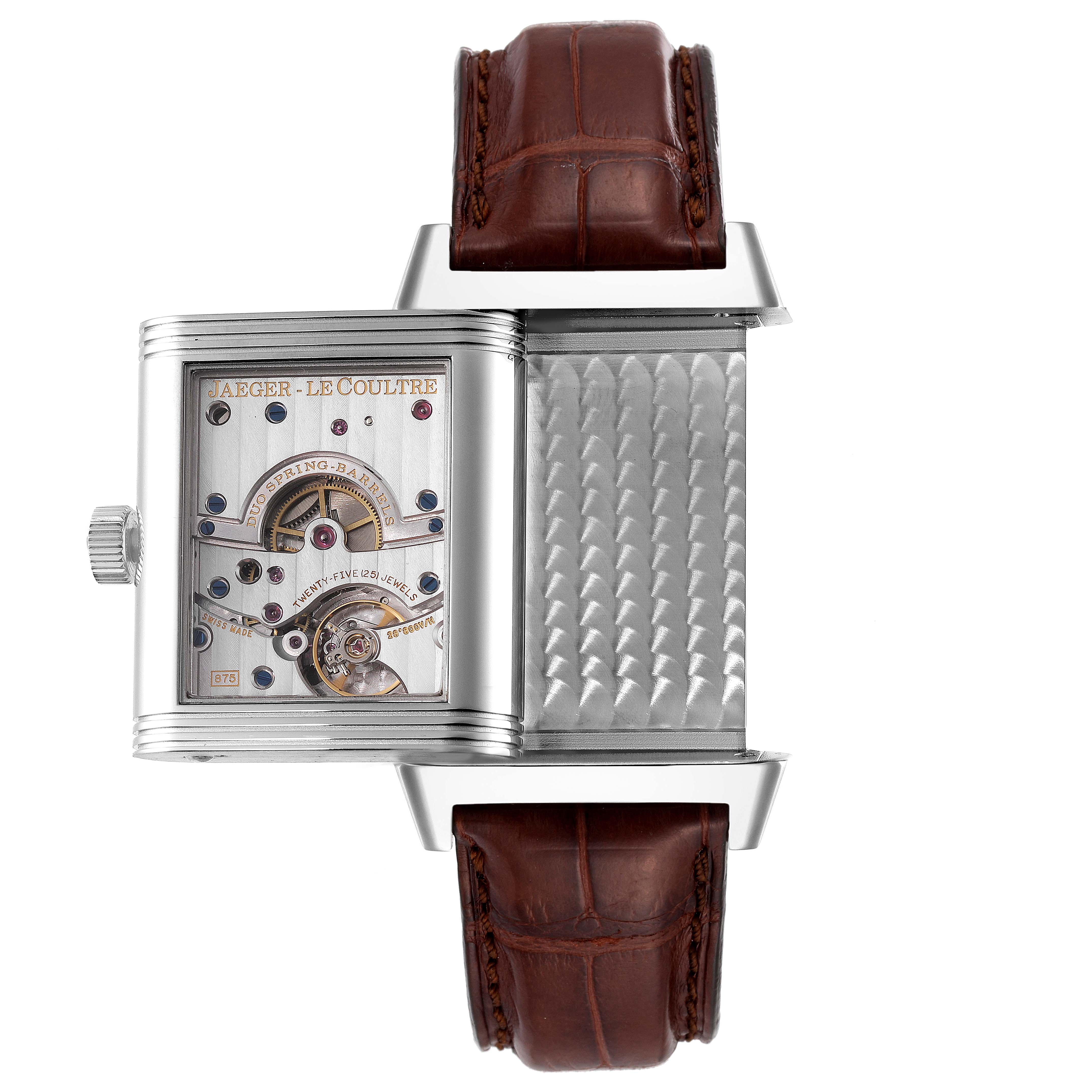 This image shows the reverse side of the Jaeger LeCoultre Reverso Q3008420 Men's Stainless Steel Silver Dial Q3008420 Men's Stainless Steel Silver Dial watch, highlighting the watch movement and brown leather strap.