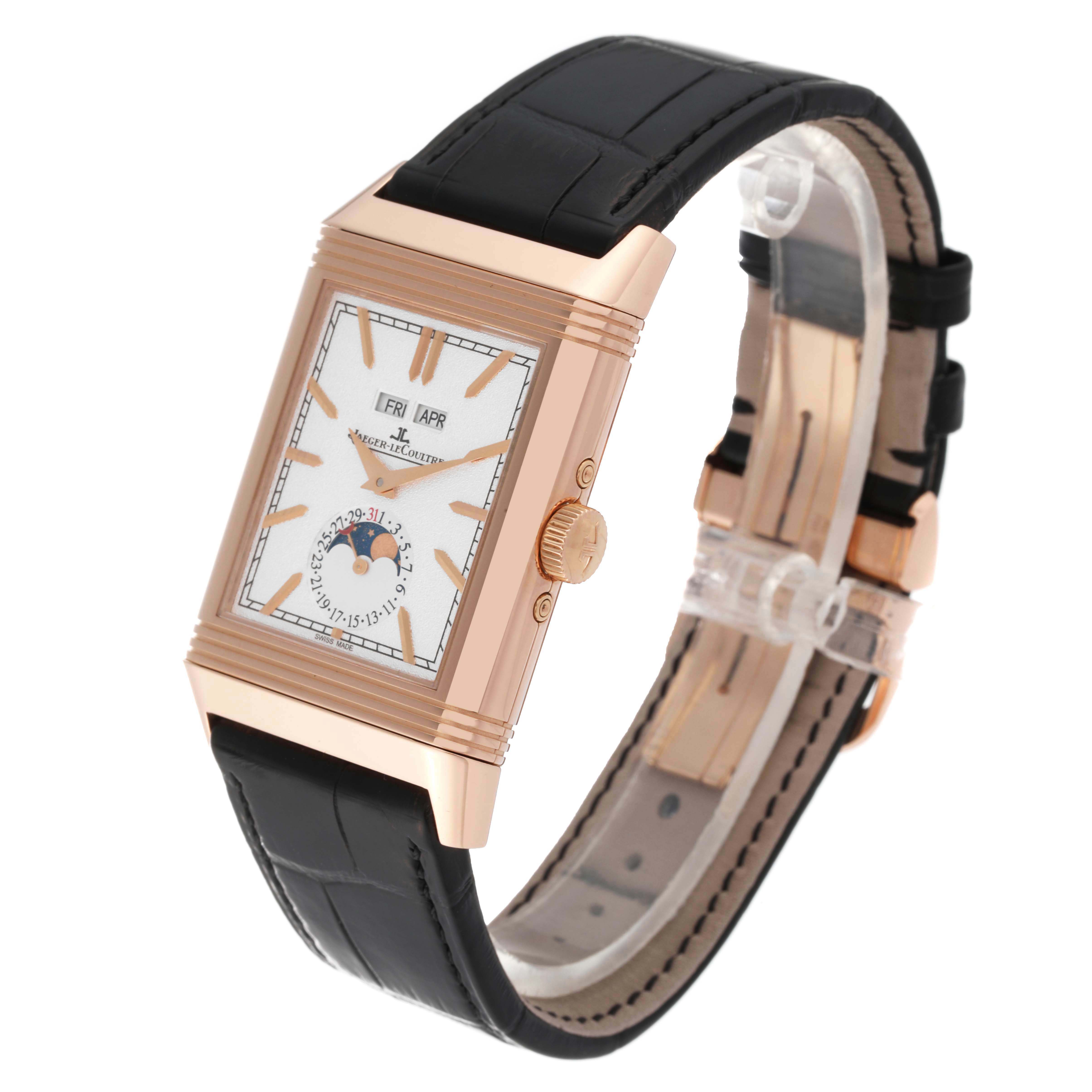 The image shows a Jaeger LeCoultre Reverso Q3912420 Men's Steel and Gold (two tone) Silver Dial Q3912420 Men's Steel and Gold (two tone) Silver Dial watch at a 3/4 angle, highlighting its face, crown, case, and strap.