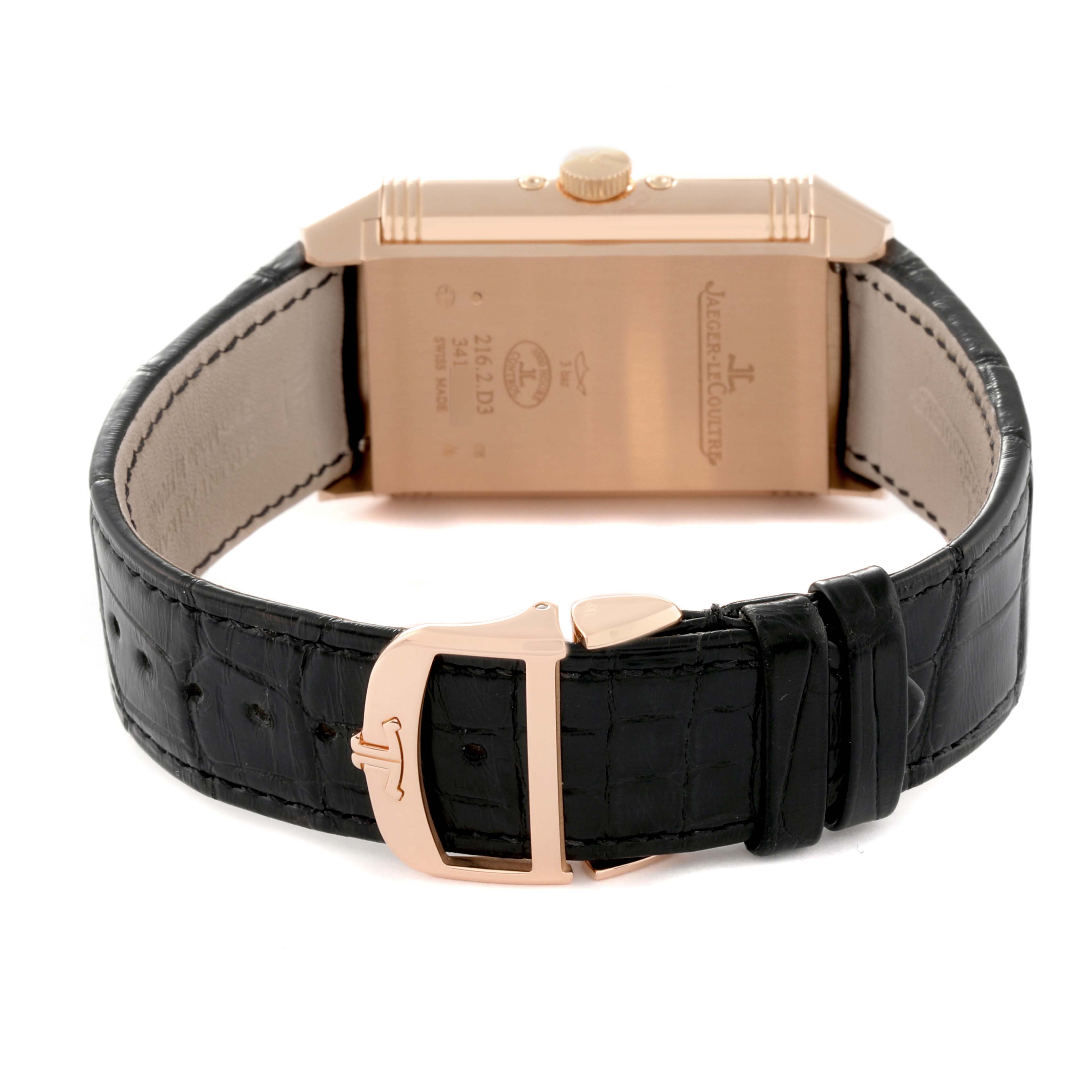 This image shows the back angle of a Jaeger LeCoultre Reverso Q3912420 Men's Steel and Gold (two tone) Silver Dial Q3912420 Men's Steel and Gold (two tone) Silver Dial watch with a black leather strap and a rose gold buckle.