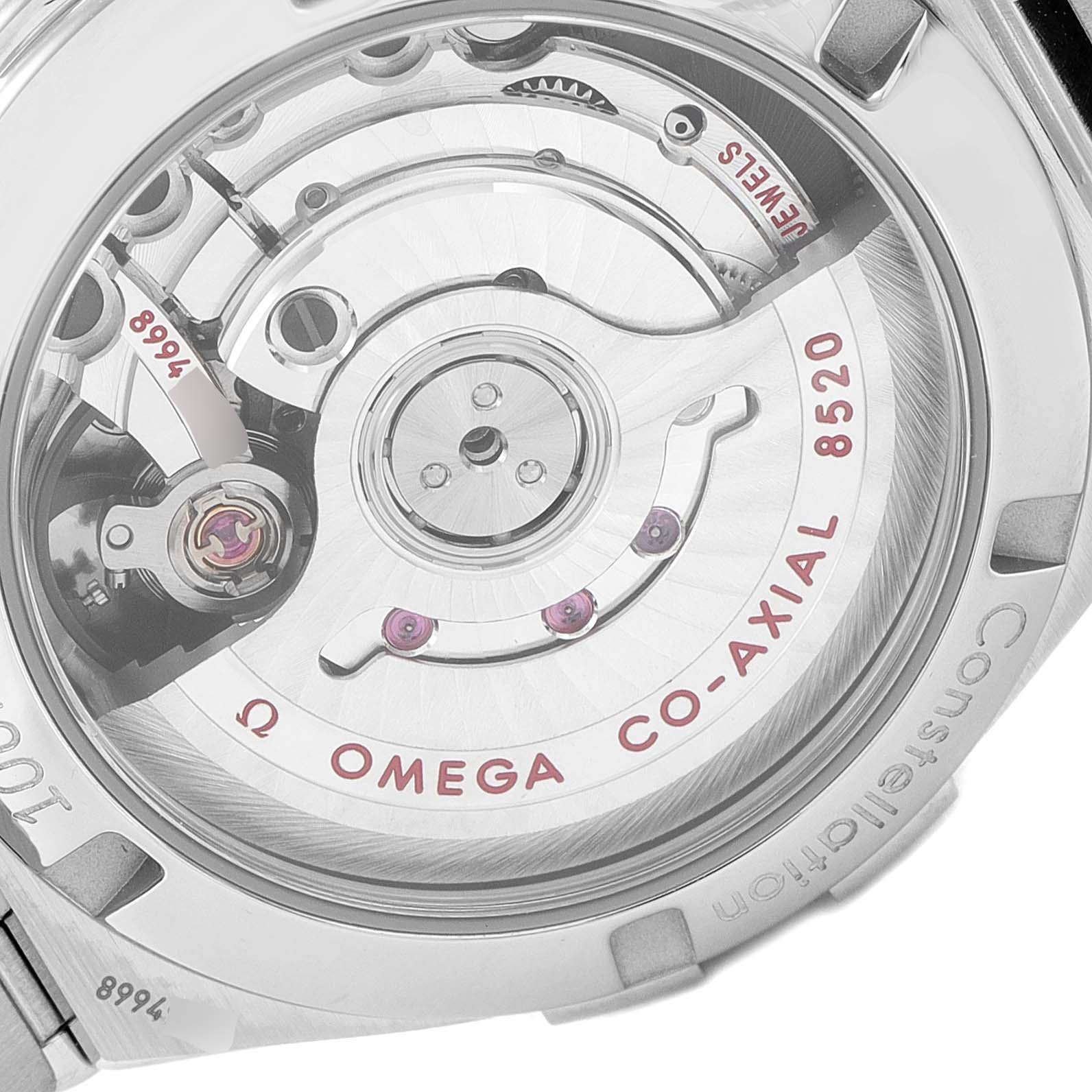 The image shows the back view of the Omega 123.15.27.20.51.001 Women
s Stainless Steel Black Dial 123.15.27.20.51.001 Women
s Stainless Steel Black Dial Constellation 27 Black Dial Diamond Watch 123.15.27.20.51.001, highlighting the Co-Axial 8520 movement.