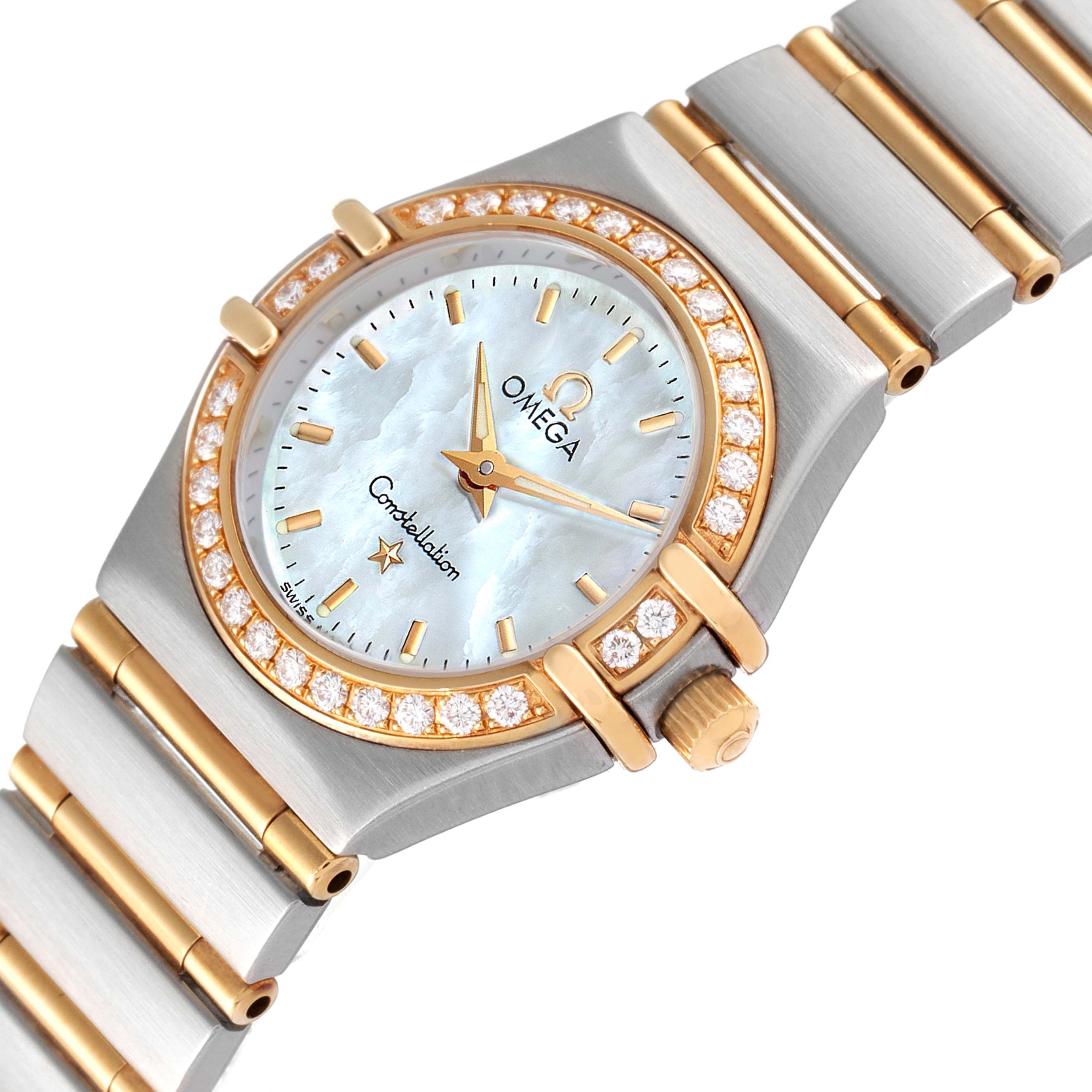 The image shows an Omega 1267.70.00 Women
s Steel and Gold (two tone) Mother of Pearl Dial 1267.70.00 Women
s Steel and Gold (two tone) Mother of Pearl Dial Constellation Steel Yellow Gold MOP Diamond Watch model 1267.70.00 from an angled top view, focusing on the face, bezel, and partial bracelet.