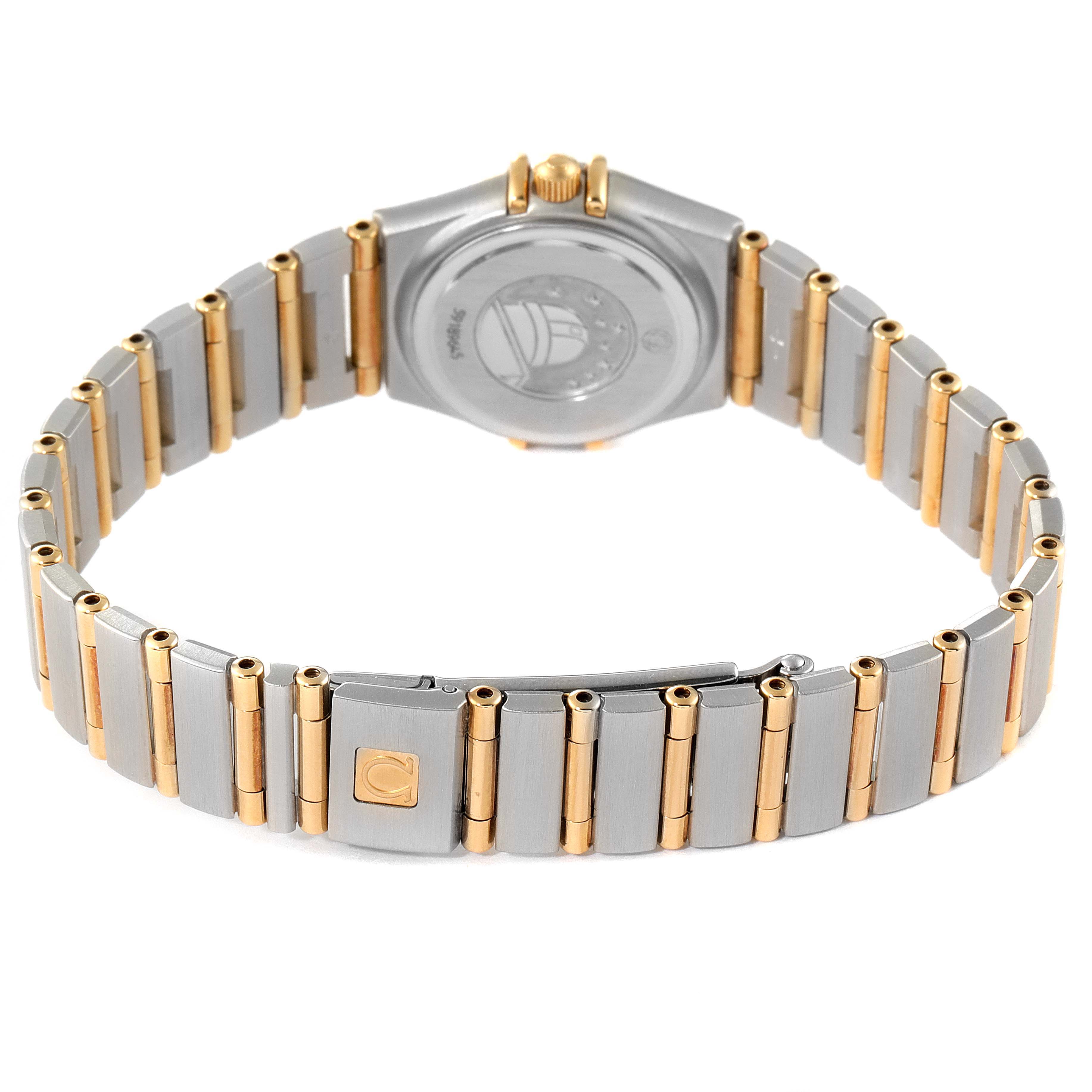 The image shows the back and bracelet of the Omega 1267.70.00 Women
s Steel and Gold (two tone) Mother of Pearl Dial 1267.70.00 Women
s Steel and Gold (two tone) Mother of Pearl Dial Constellation Steel Yellow Gold MOP Diamond Watch 1267.70.00.