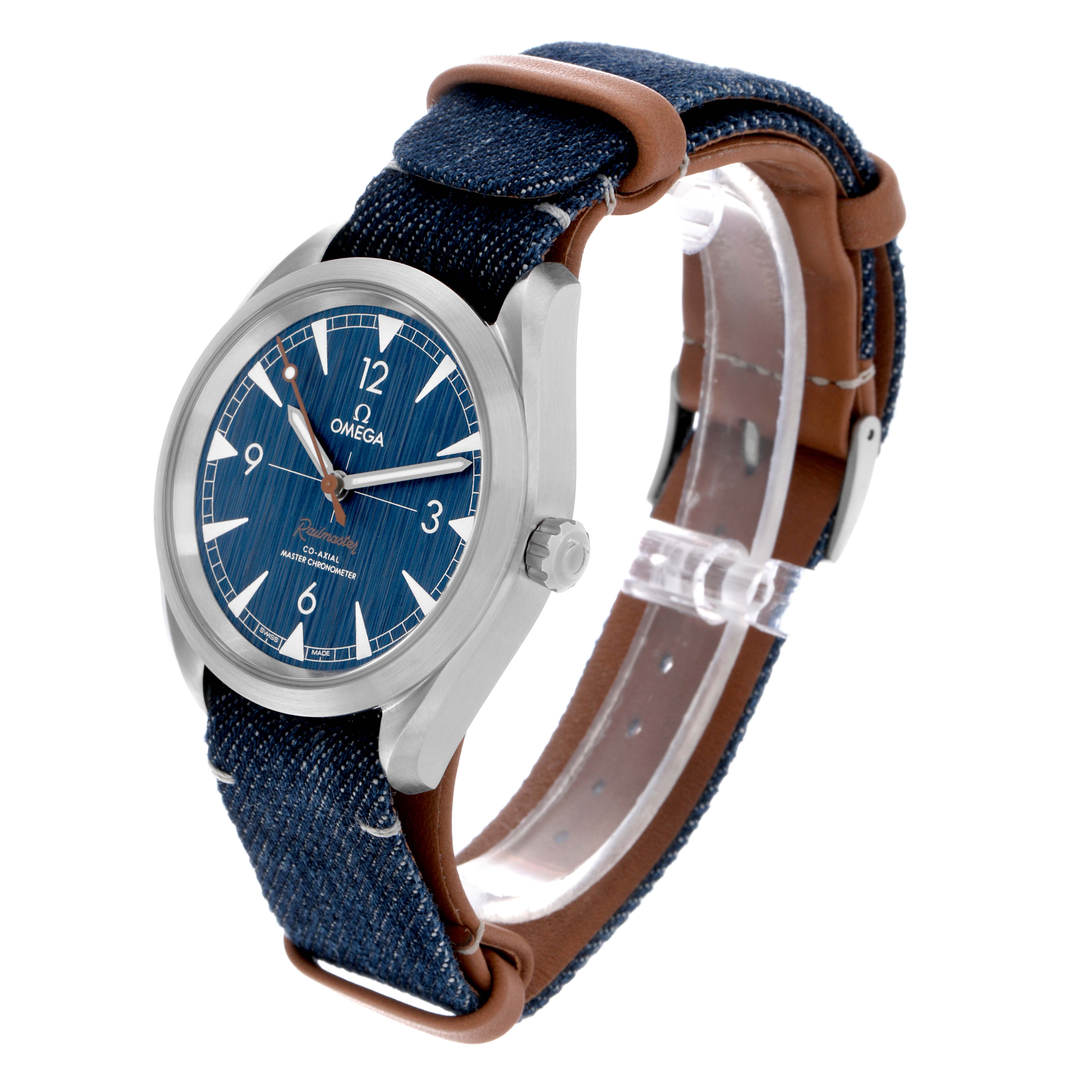 The Omega Aqua Terra 220.12.40.20.01.001 Men's Stainless Steel Blue Dial 220.12.40.20.01.001 Men's Stainless Steel Blue Dial watch is shown at a three-quarter angle, highlighting the blue dial, case, and denim strap.