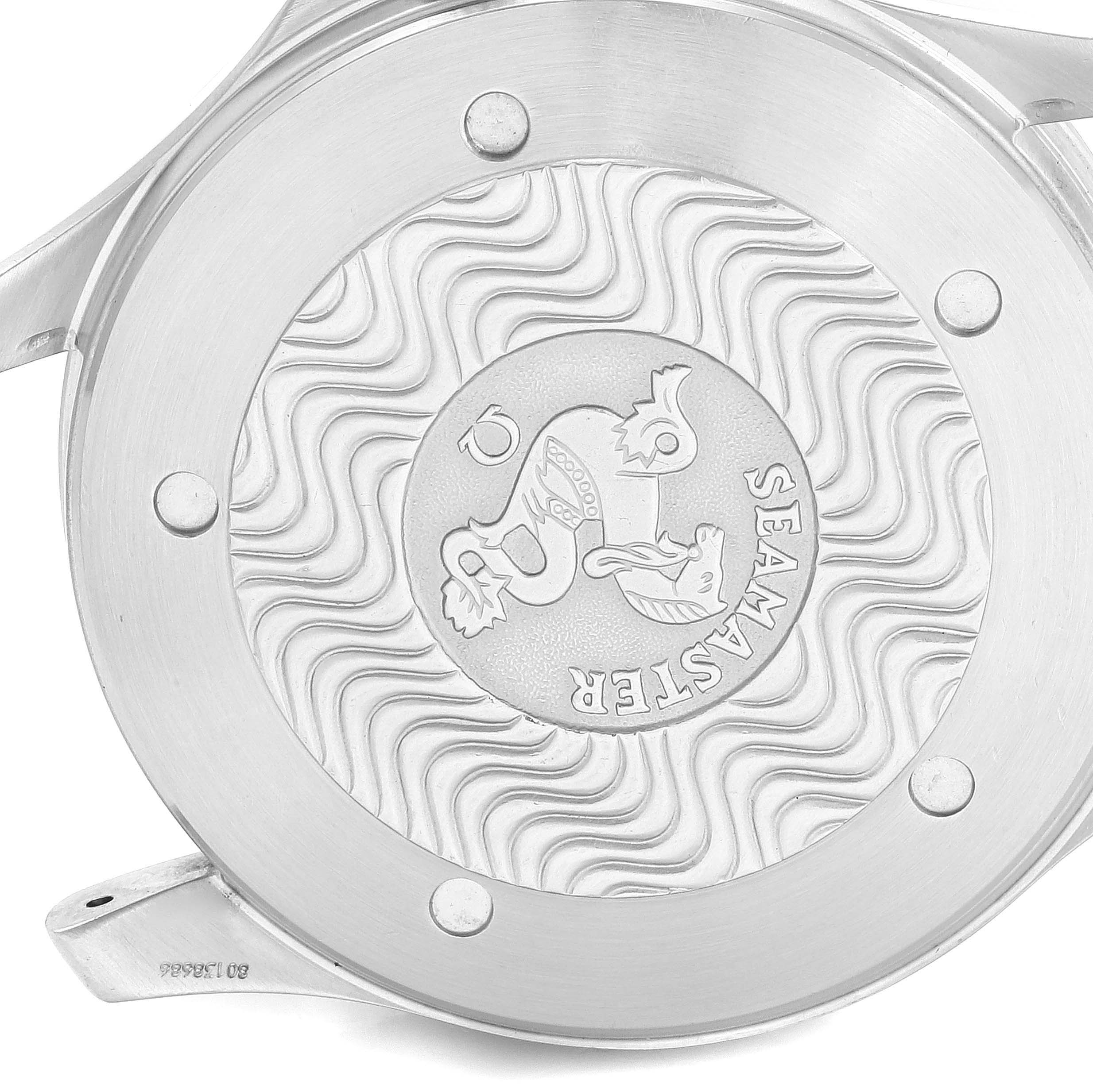 The image shows the case back of an Omega Seamaster 2538.20.00 Men's Stainless Steel White Dial 2538.20.00 Men's Stainless Steel White Dial watch, featuring its emblematic logo and wave pattern design.