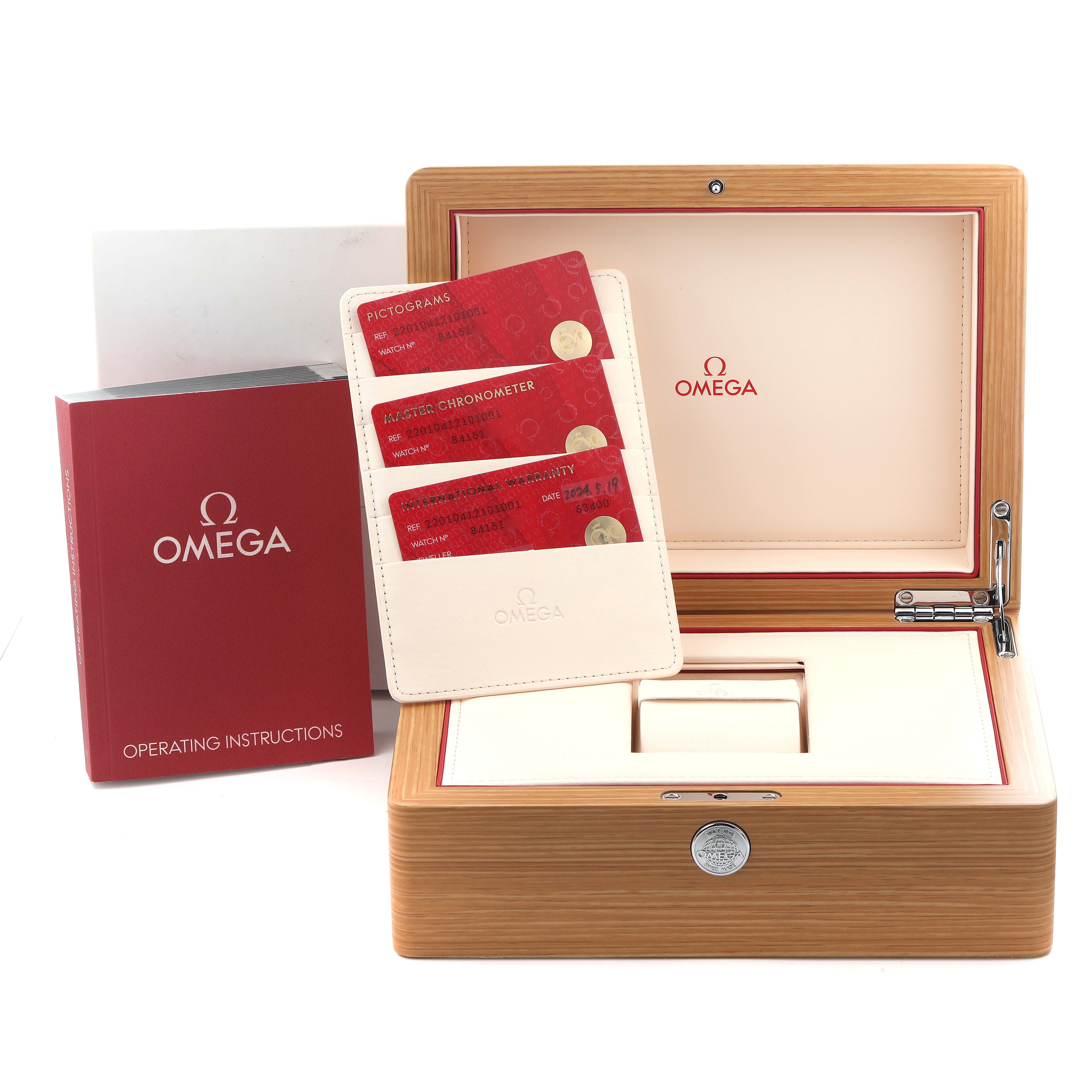 The image shows an Omega Aqua Terra 220.10.41.21.01.001 Men's Stainless Steel Black Dial 220.10.41.21.01.001 Men's Stainless Steel Black Dial watch box, warranty cards, and an operating manual from a straight-on view.