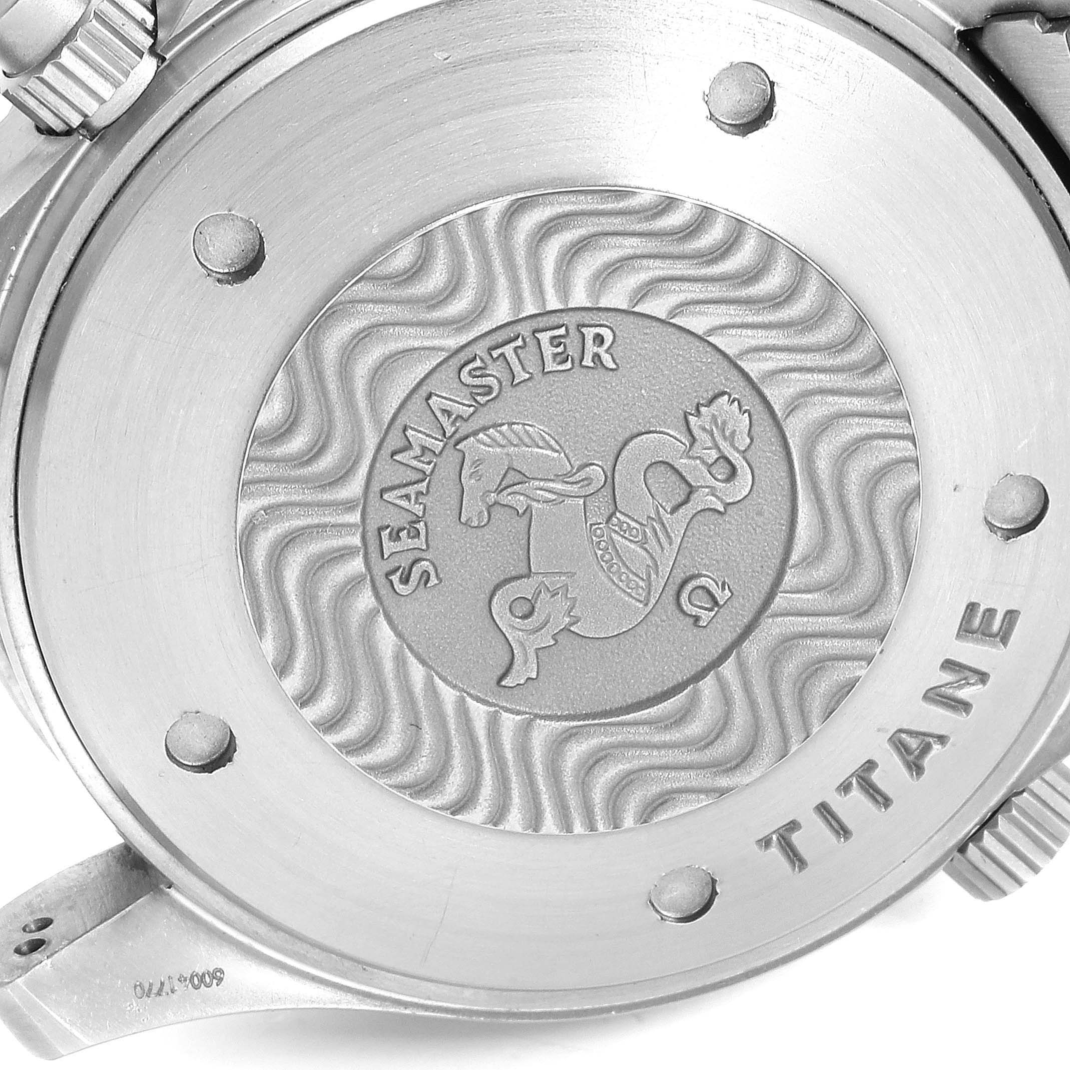 This image shows the case back of an Omega Seamaster 2298.80.00 Men
s Titanium Blue Dial 2298.80.00 Men
s Titanium Blue Dial watch, featuring the brand
s emblem and the word "Titane."