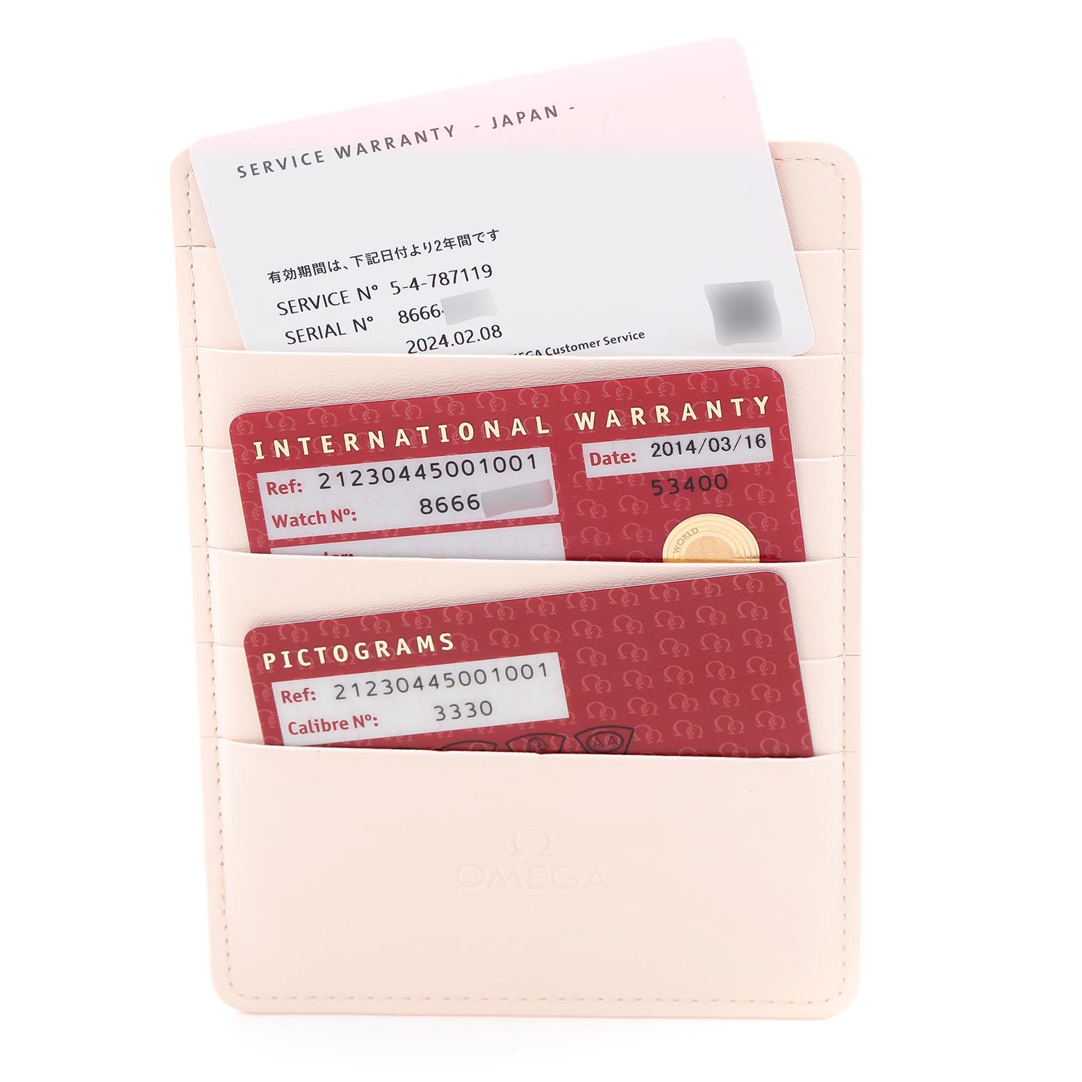 The image shows warranty and pictogram cards for an Omega Seamaster 212.30.44.50.01.001 Men
s Stainless Steel Black Dial 212.30.44.50.01.001 Men
s Stainless Steel Black Dial, arranged in a leather card holder.