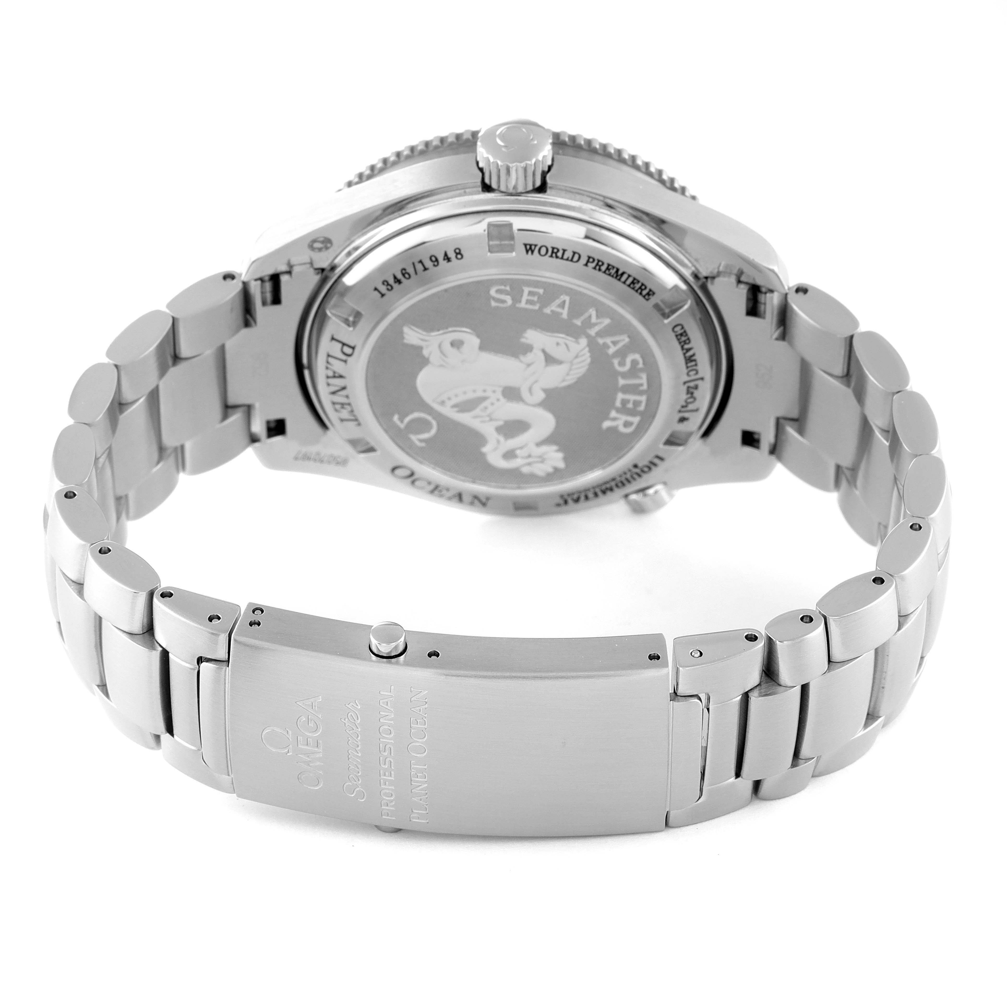 This image shows the back and clasp of the Omega Seamaster Planet Ocean watch, highlighting its engraved case back and metal bracelet.