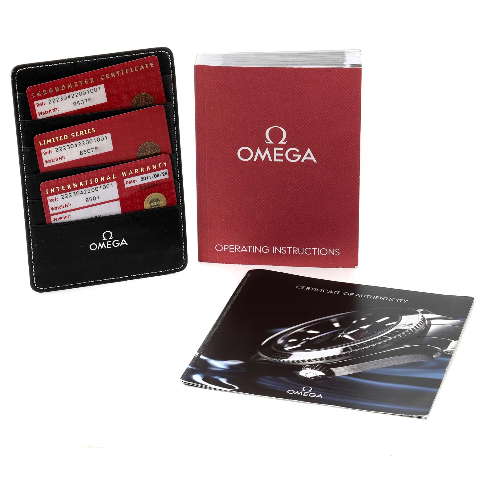 The image shows the accessories for the Omega Planet Ocean 222.30.42.20.01.001 Men
s Stainless Steel Black Dial 222.30.42.20.01.001 Men
s Stainless Steel Black Dial watch, including certificates, warranty cards, and operating instructions.