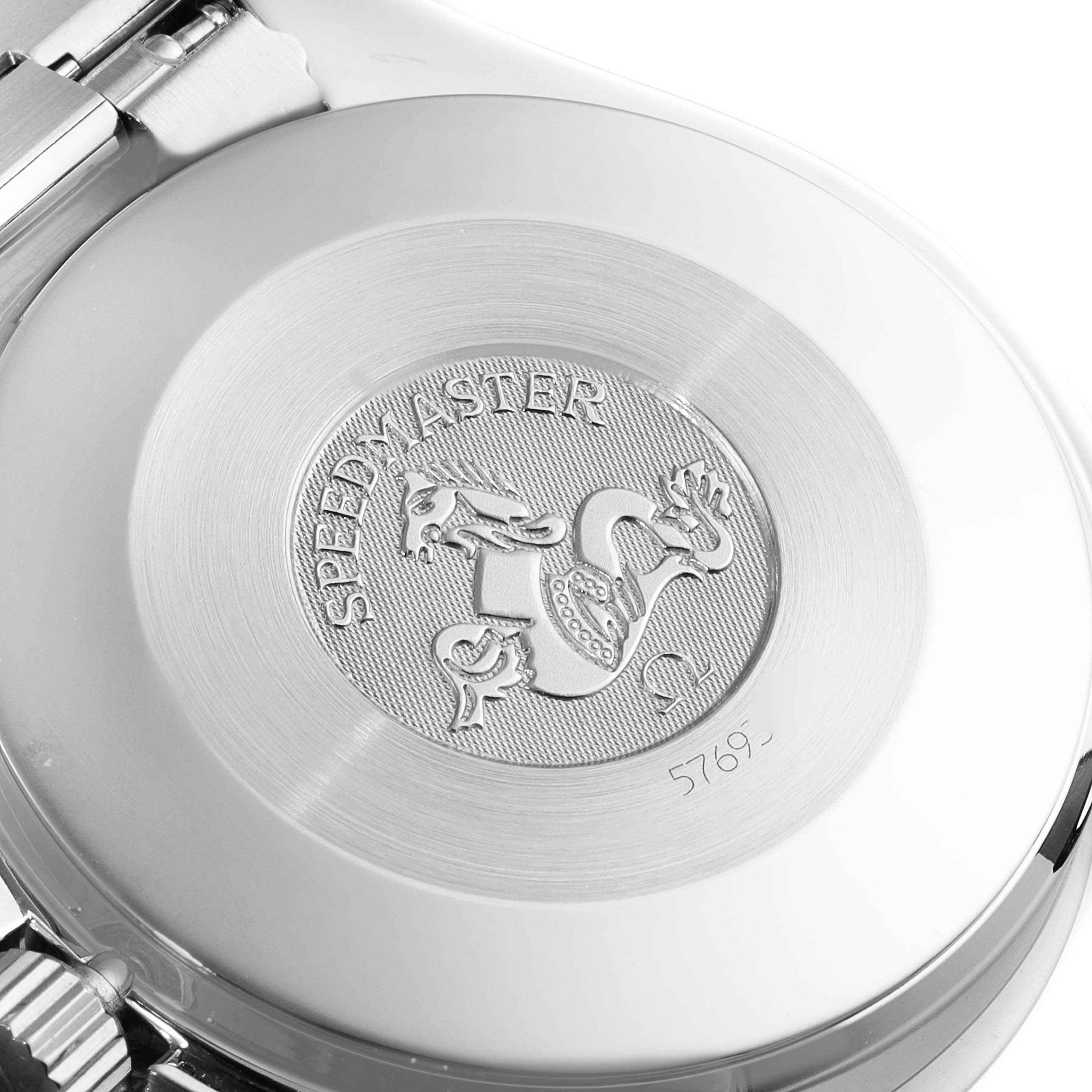 The image shows the back case of the Omega Speedmaster 3510.21.00 Men's Stainless Steel Silver Dial 3510.21.00 Men's Stainless Steel Silver Dial watch, featuring the engraved emblem and the model name.