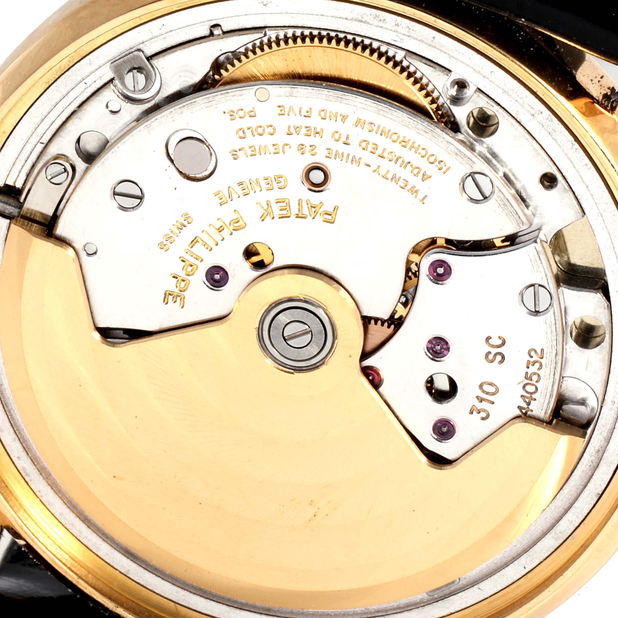 The image shows a close-up of the movement and internal mechanism of the Patek Philippe Calatrava 3802 Men's Yellow Gold Beige Dial 3802 Men's Yellow Gold Beige Dial watch.