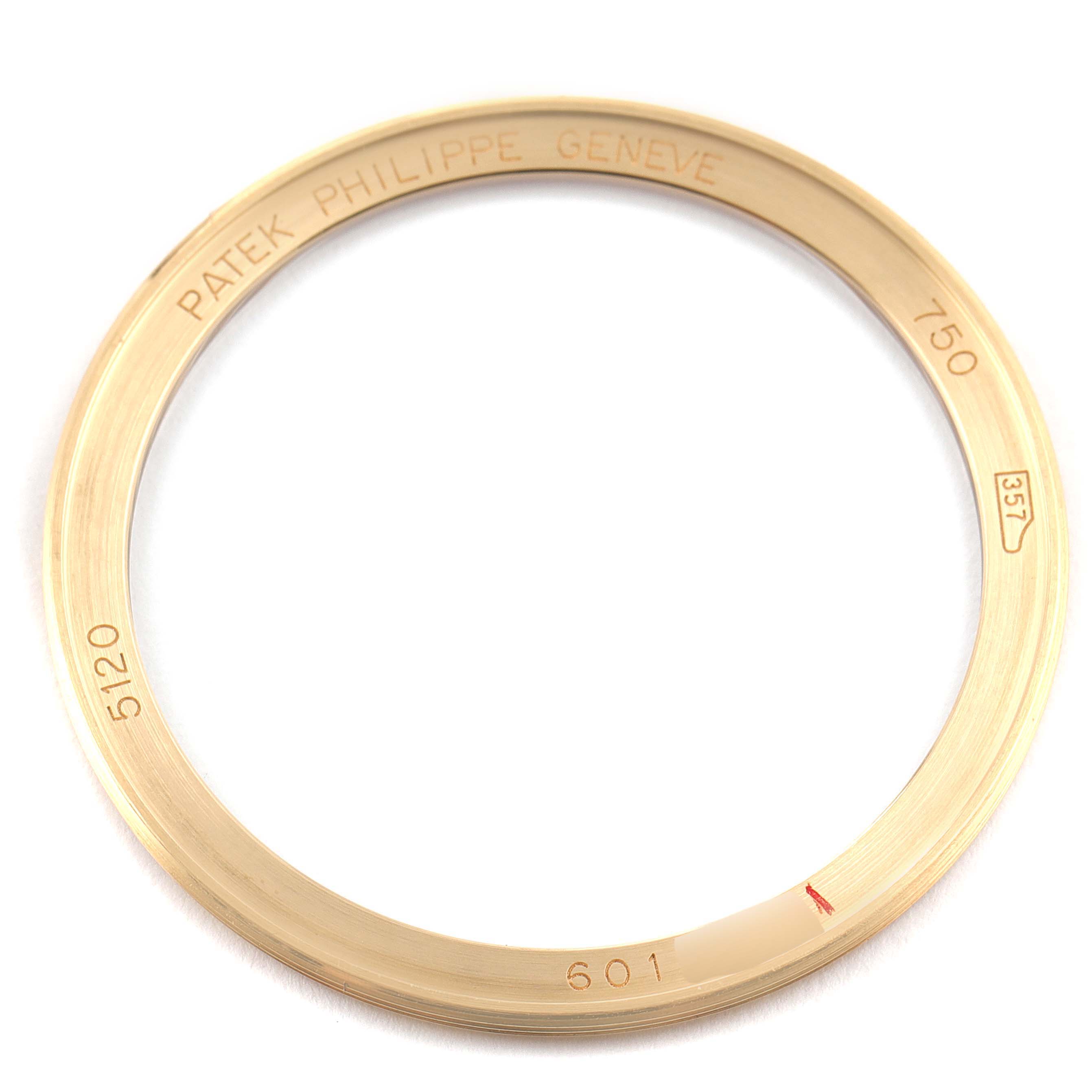 This image shows a gold watch bezel for the Patek Philippe Calatrava 5120J Men
s Yellow Gold White Dial 5120J Men
s Yellow Gold White Dial model, viewed from above.