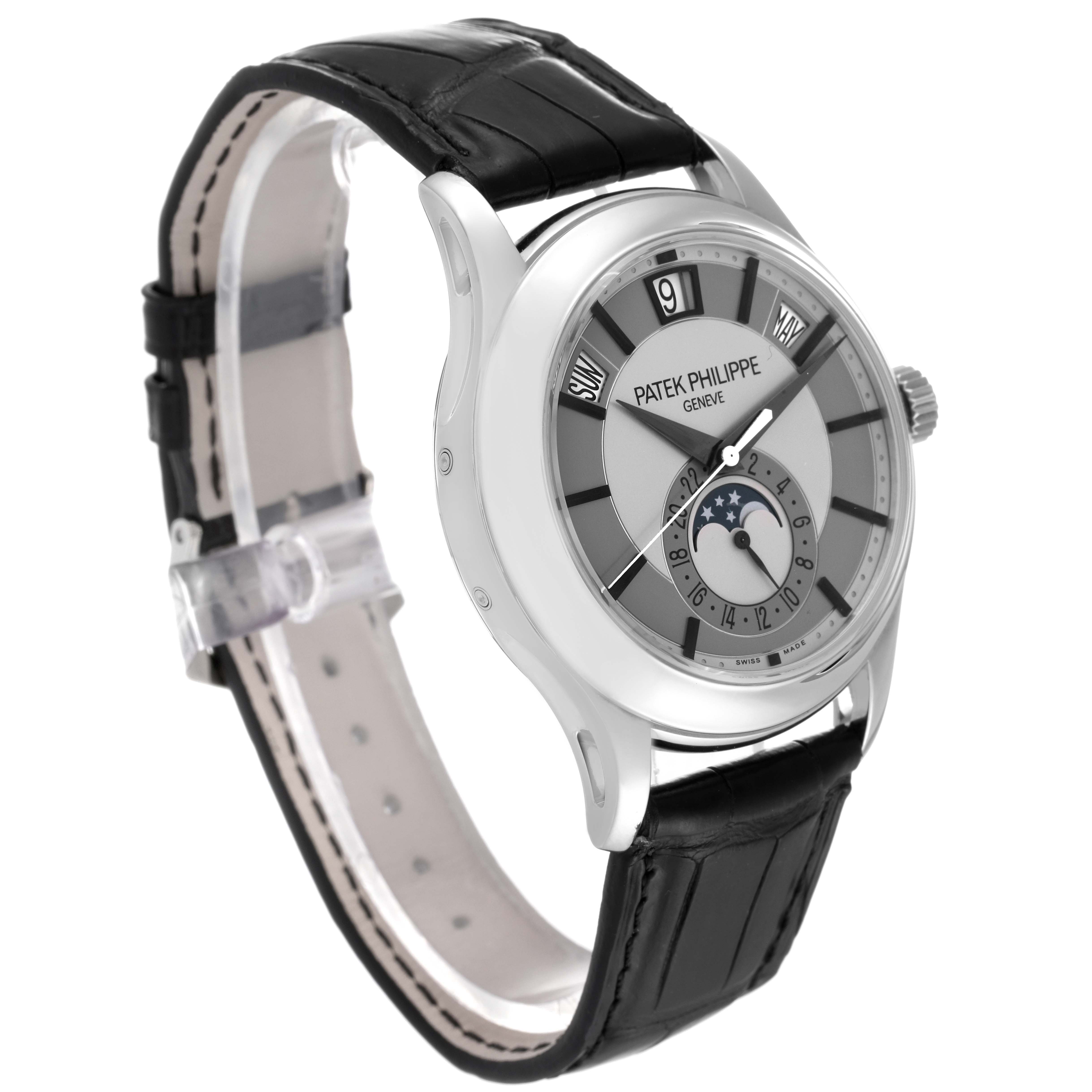 This image shows a side and slightly angled view of the Patek Philippe Complications 5205G-001 Men's White Gold Silver Dial 5205G-001 Men's White Gold Silver Dial watch, highlighting its face, strap, and crown.