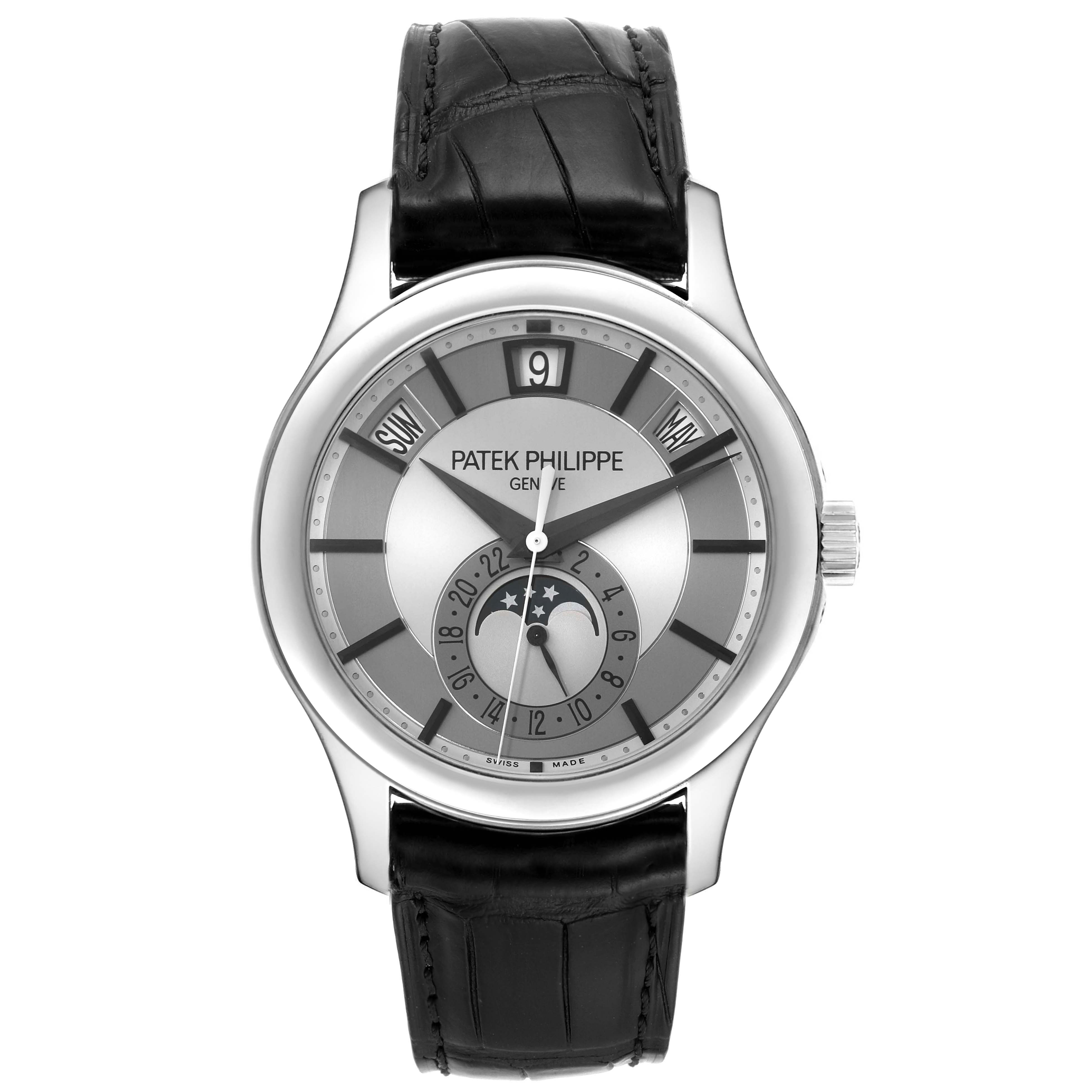 The Patek Philippe Complications 5205G-001 Men's White Gold Silver Dial 5205G-001 Men's White Gold Silver Dial model watch is shown from a front angle, displaying its dial, hands, sub-dials, and black leather strap.