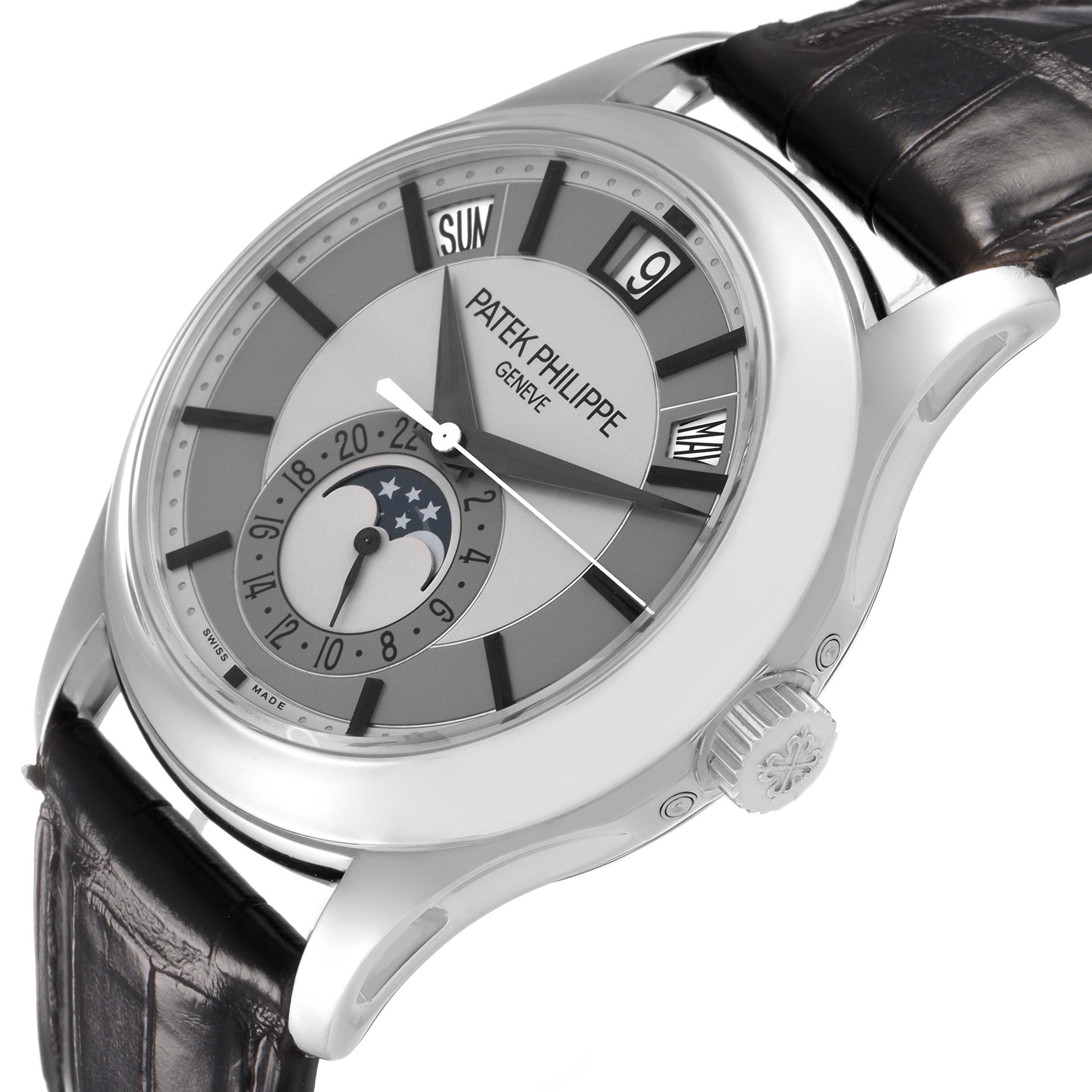 The Patek Philippe Complications 5205G-001 Men's White Gold Silver Dial watch is shown at a slight angle, displaying the dial, hands, date subdial, and part of the strap.