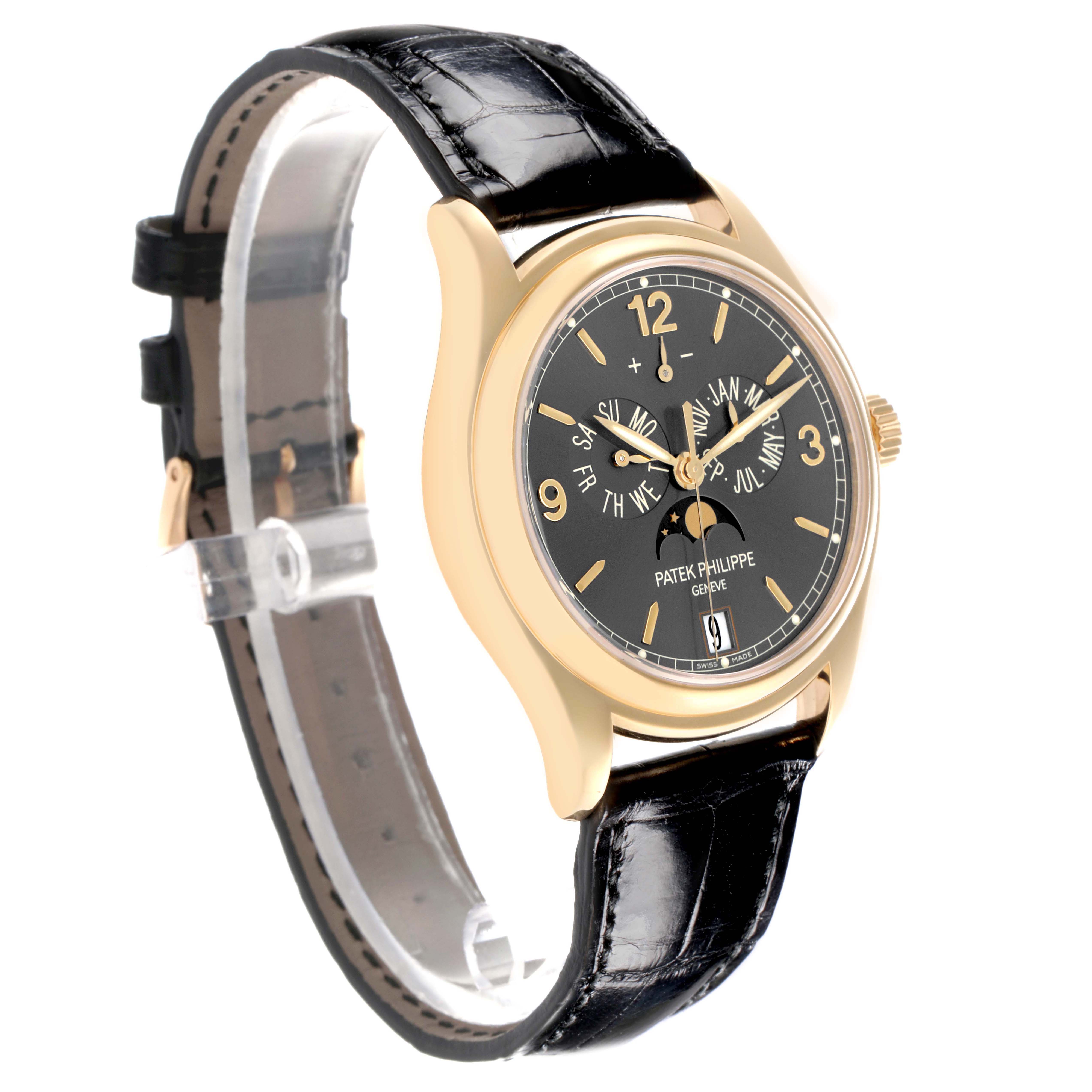 The Patek Philippe Complications 5146J-010 Men's Yellow Gold Grey Dial watch is shown at a three-quarter angle, displaying the dial, gold case, leather strap, and side crown.