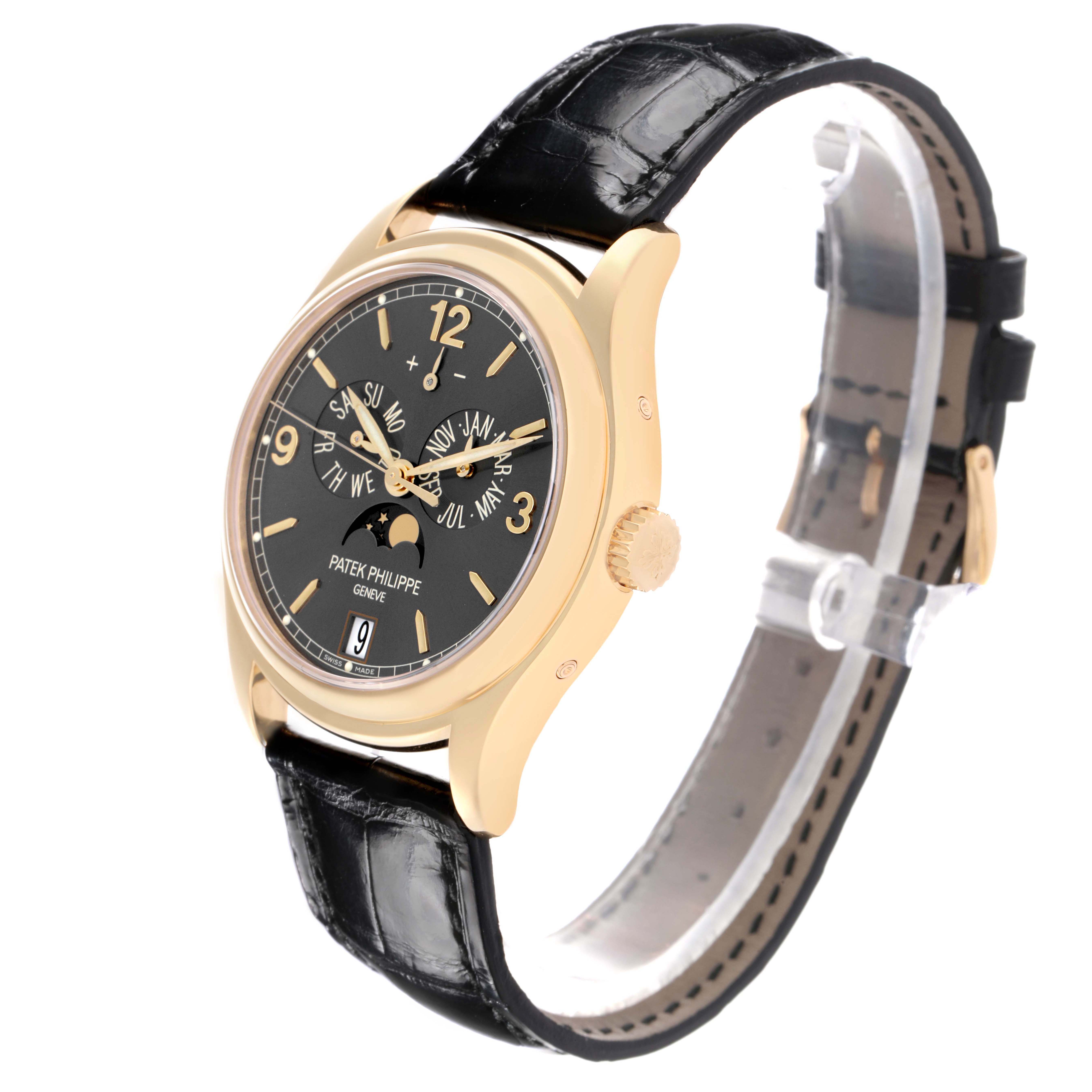 The Patek Philippe Complications 5146J-010 Men's Yellow Gold Grey Dial watch is shown from a three-quarter angle, highlighting the face, case, and strap.