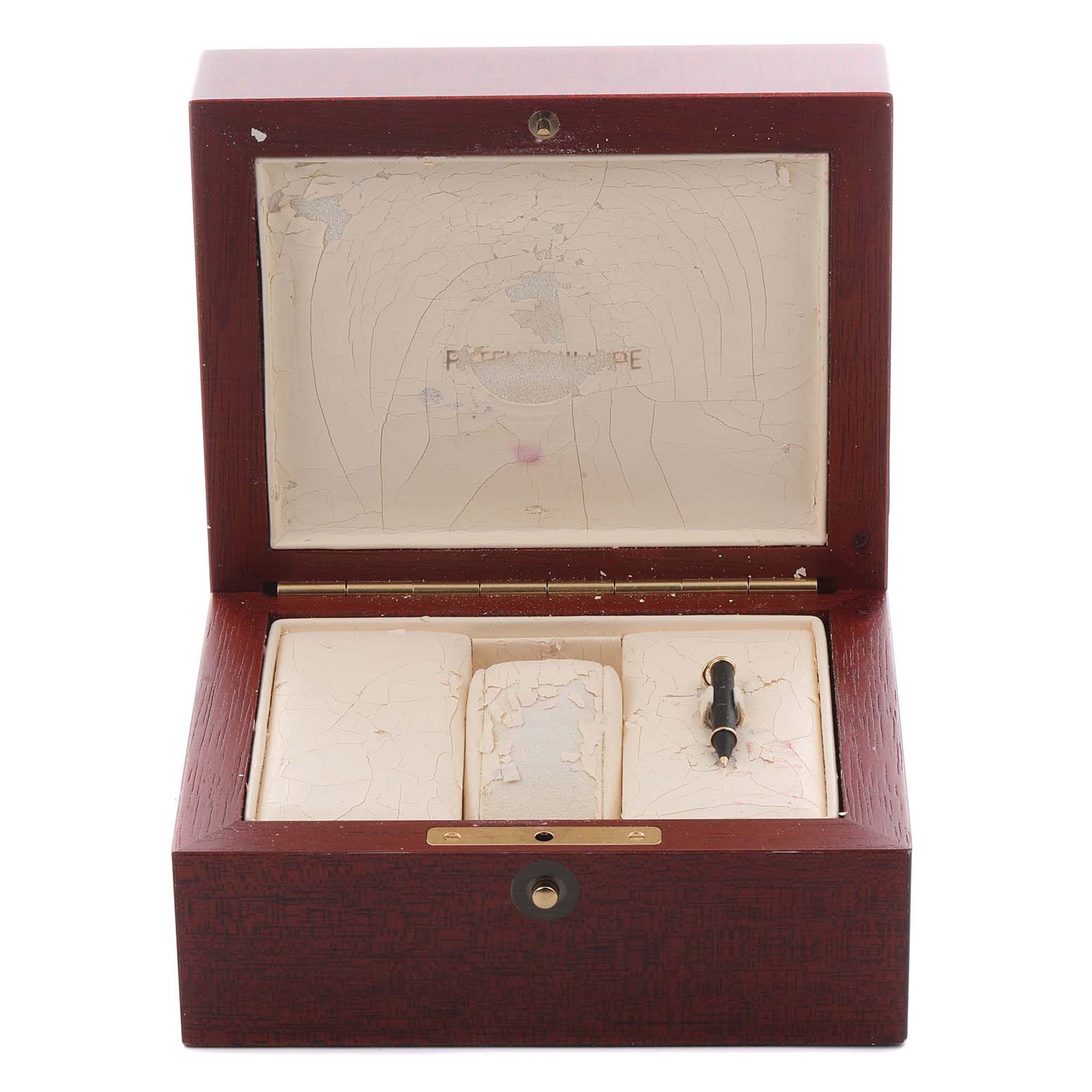 The image shows an open watch box for a Patek Philippe Complications 5146J-010 Men's Yellow Gold Grey Dial 5146J-010 Men's Yellow Gold Grey Dial model, revealing its interior with a peeling lining and a tool.