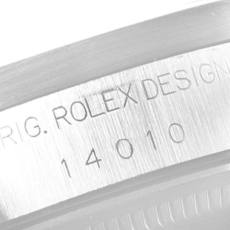 This close-up image shows the engravings on the case of a Rolex Air-King 14010 Men's Stainless Steel Black Dial 14010 Men's Stainless Steel Black Dial watch, including the model number 14010.