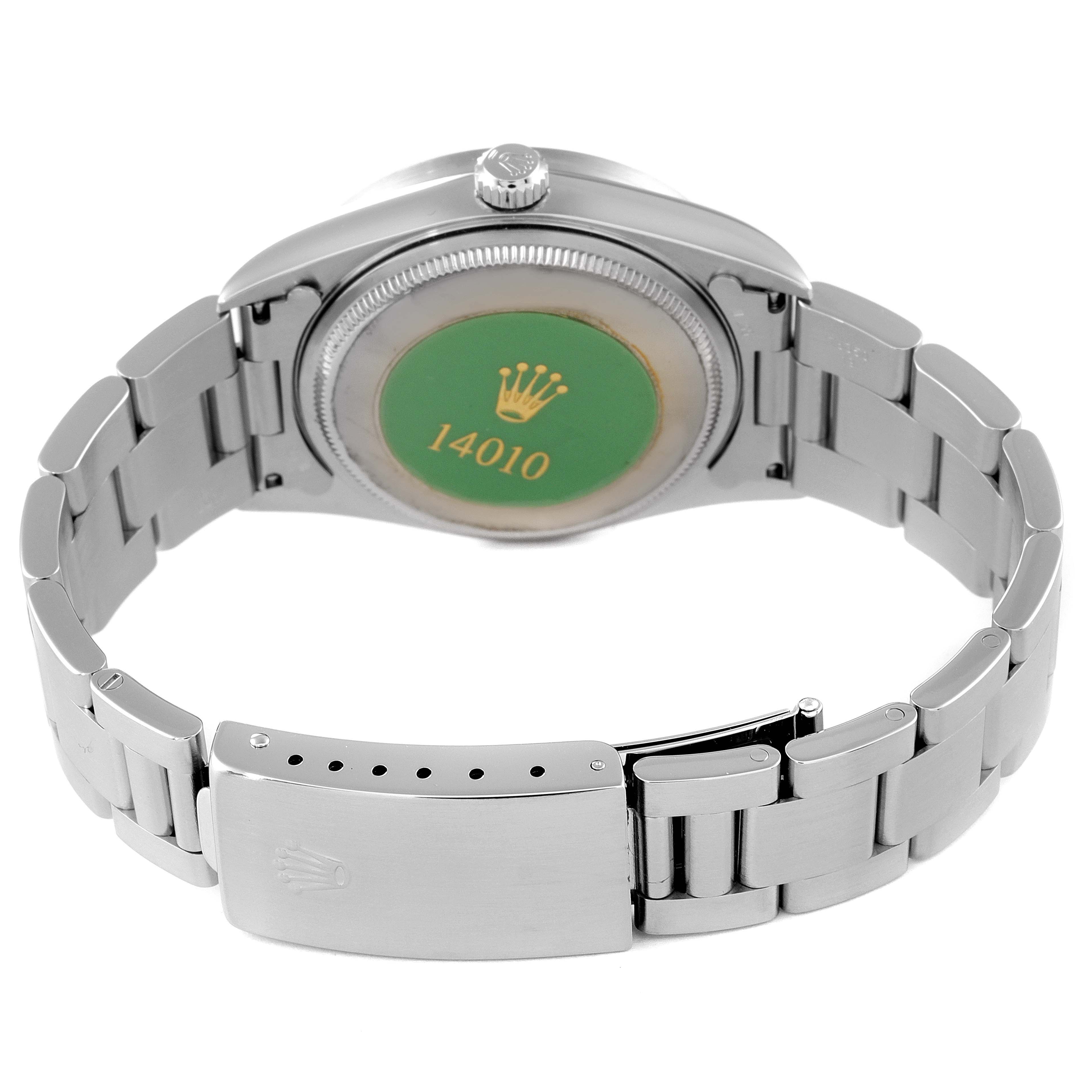 The back view of the Rolex Air-King 14010 Men's Stainless Steel Black Dial 14010 Men's Stainless Steel Black Dial watch shows the bracelet, case back, and clasp.