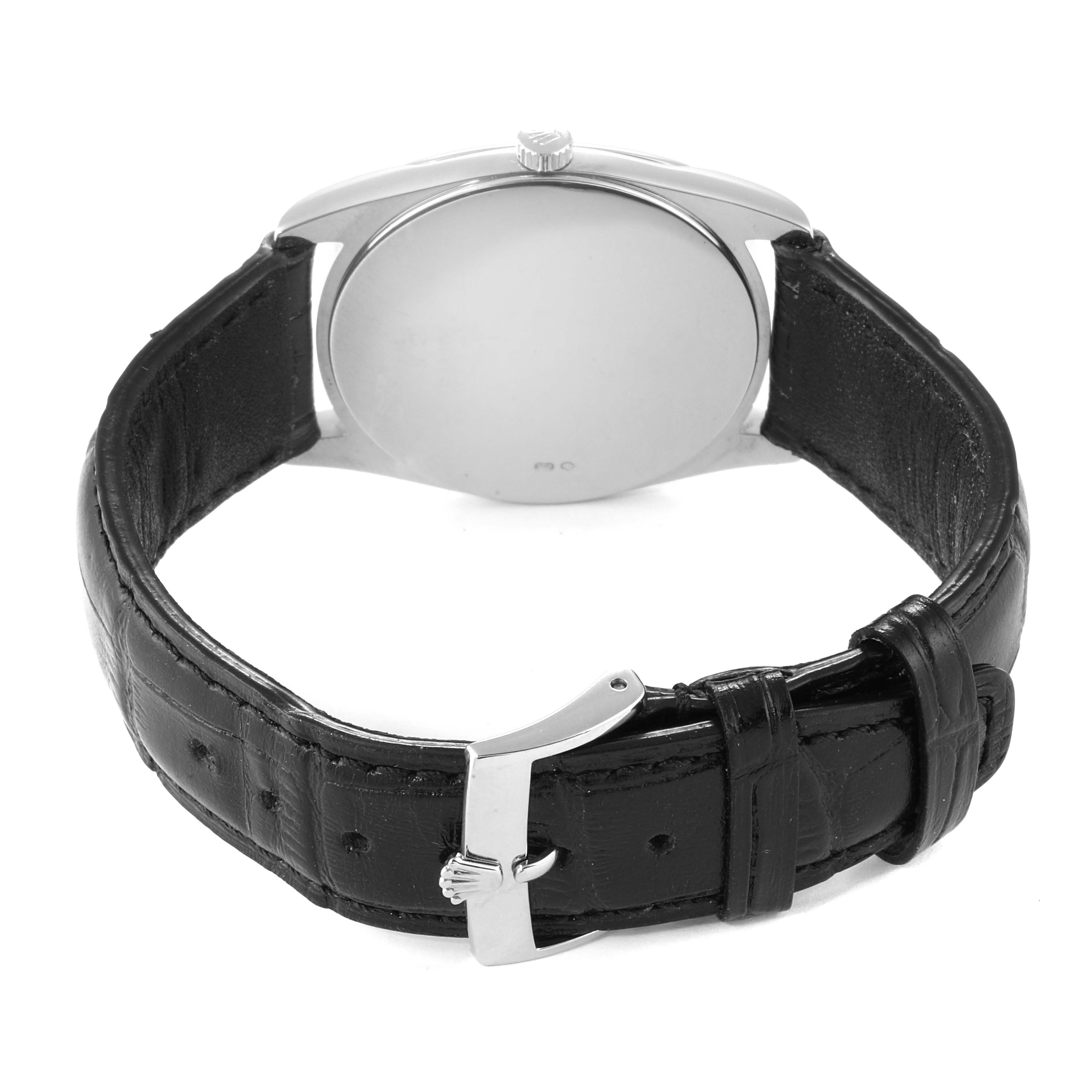 The image shows the back view of the Rolex Cellini 4233 Men
s White Gold White Dial 4233 Men
s White Gold White Dial watch, including its leather strap and buckle.