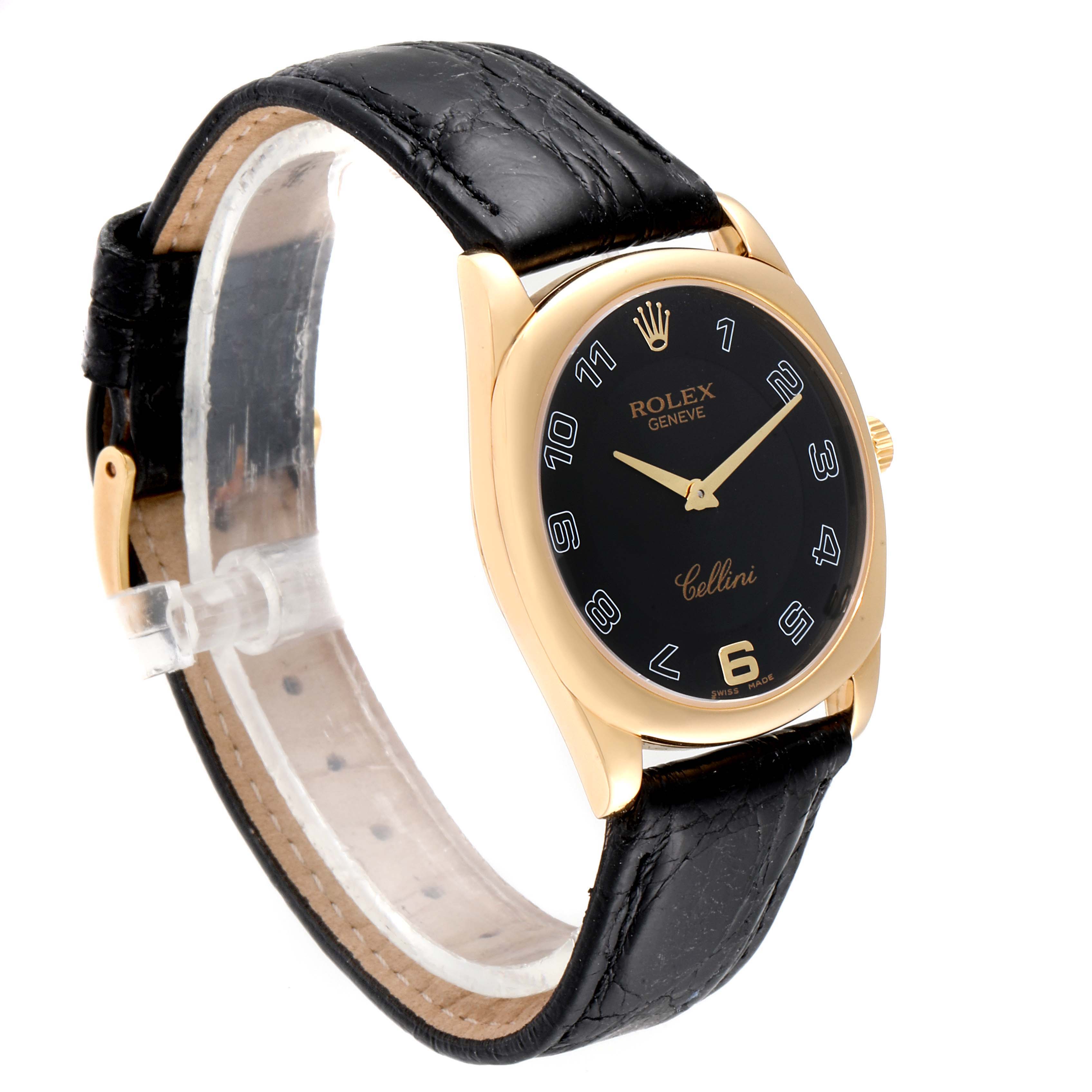 This image shows a Rolex Cellini 4233 Men's Yellow Gold Black Dial 4233 Men's Yellow Gold Black Dial watch at a slight angle, highlighting the black dial, gold case, and black leather strap.